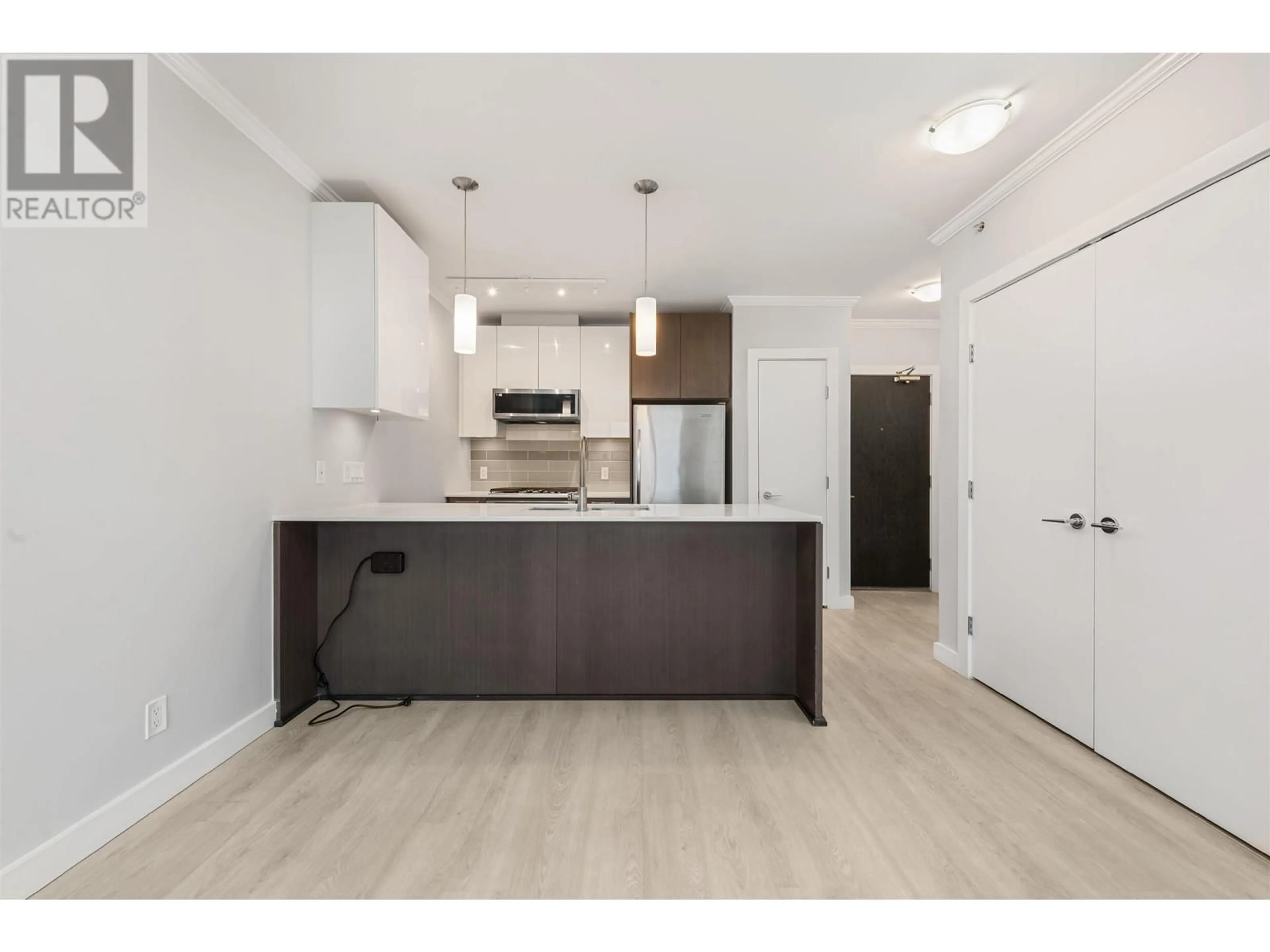 Open concept kitchen for 1206 6971 ELMBRIDGE WAY, Richmond British Columbia V7C0A5