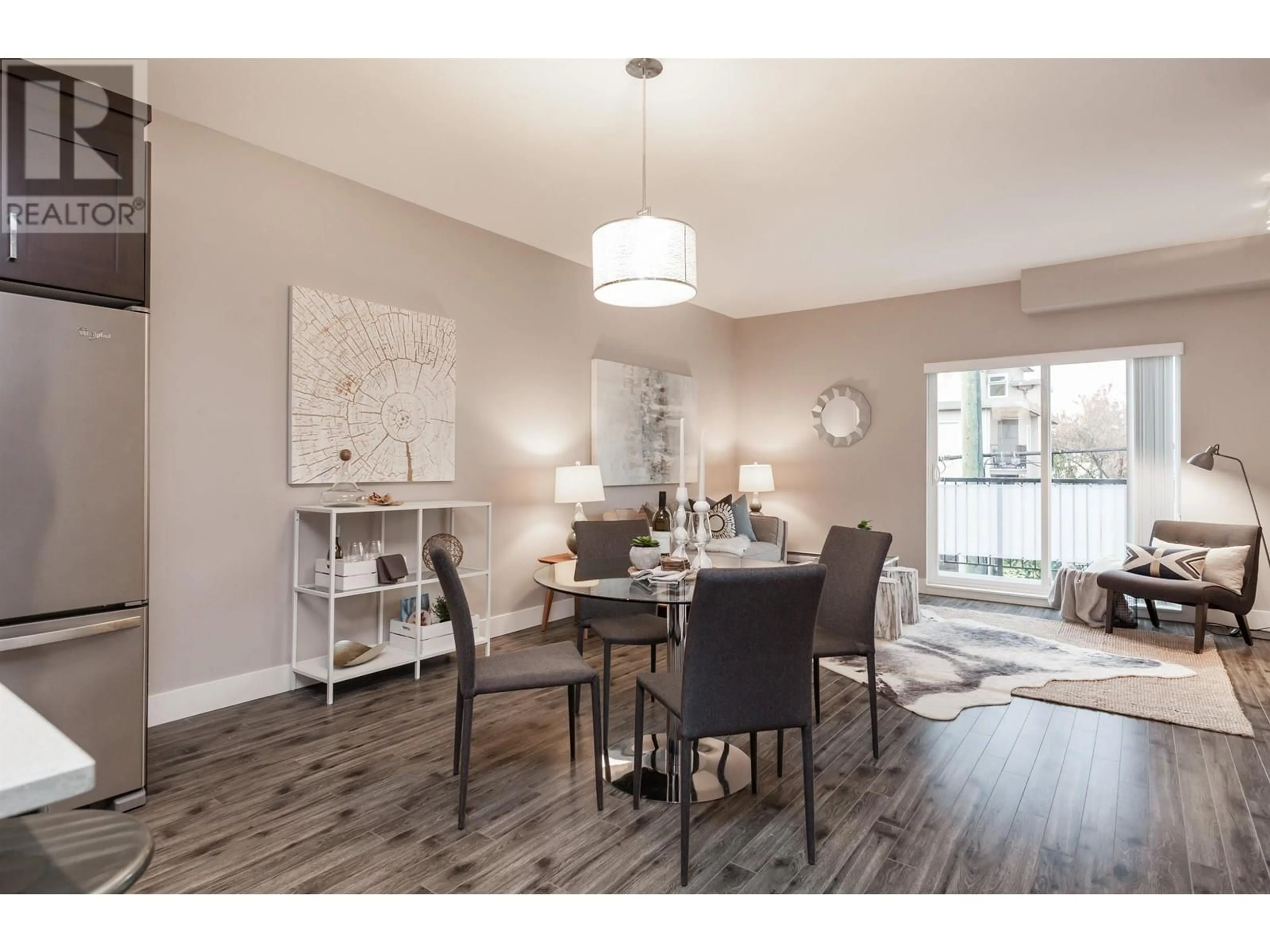 Dining room, wood floors, cottage for 211 2273 TRIUMPH STREET, Vancouver British Columbia V5L1L2