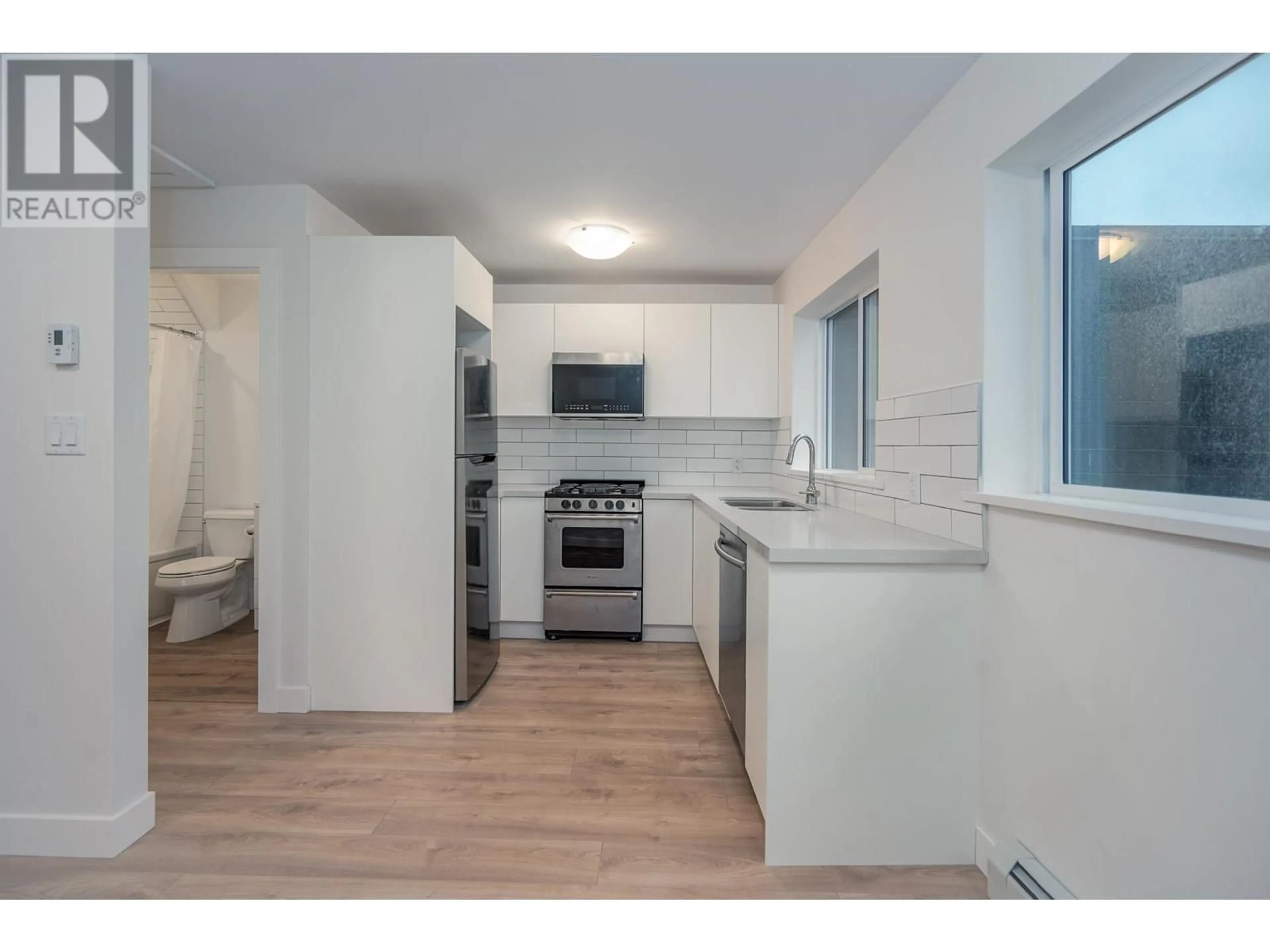 Standard kitchen, wood floors, cottage for 1827 PANDORA STREET, Vancouver British Columbia V5L1M2