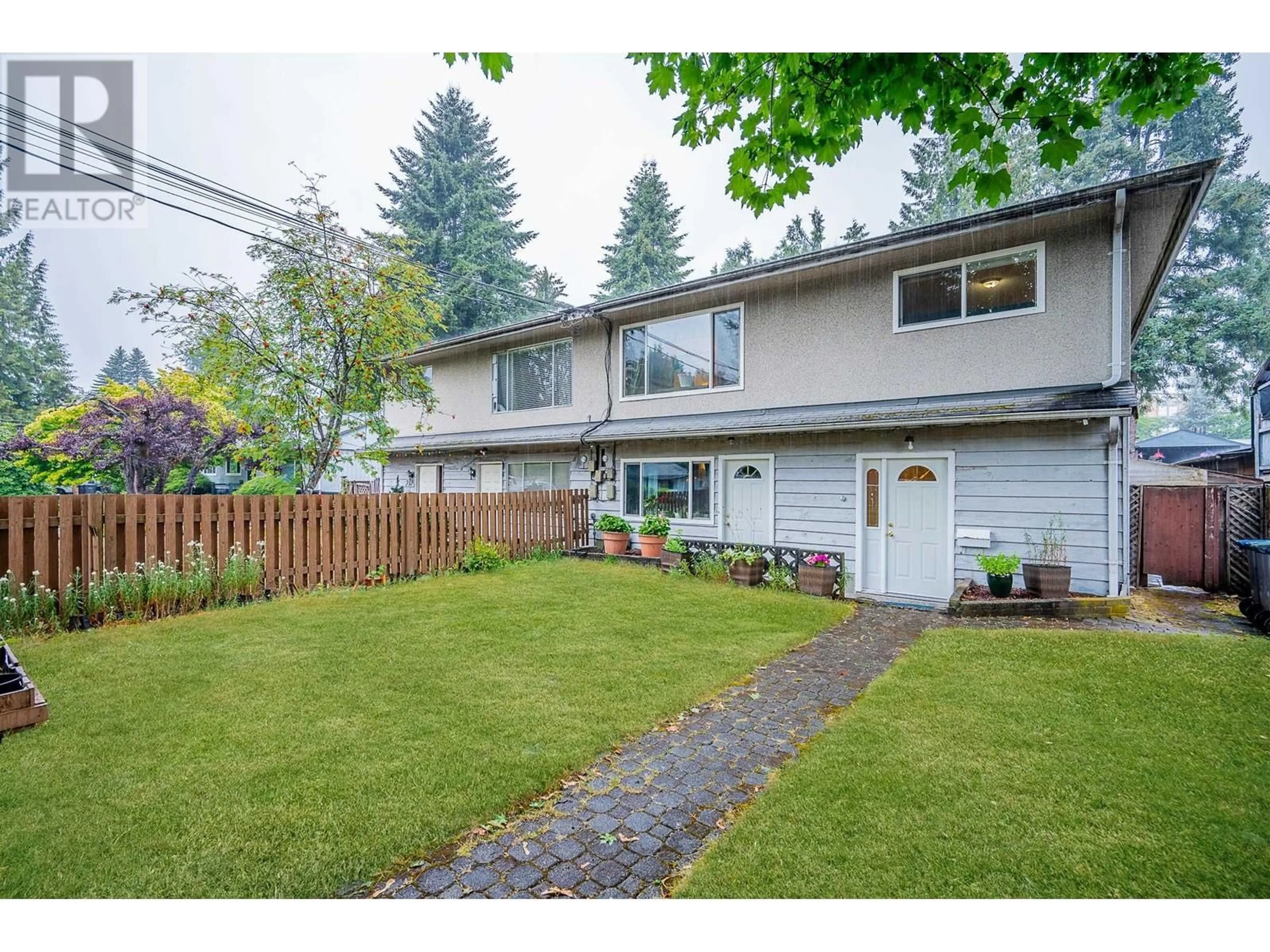 Frontside or backside of a home, the fenced backyard for 2127 CENTRAL AVENUE, Port Coquitlam British Columbia V3C1V4