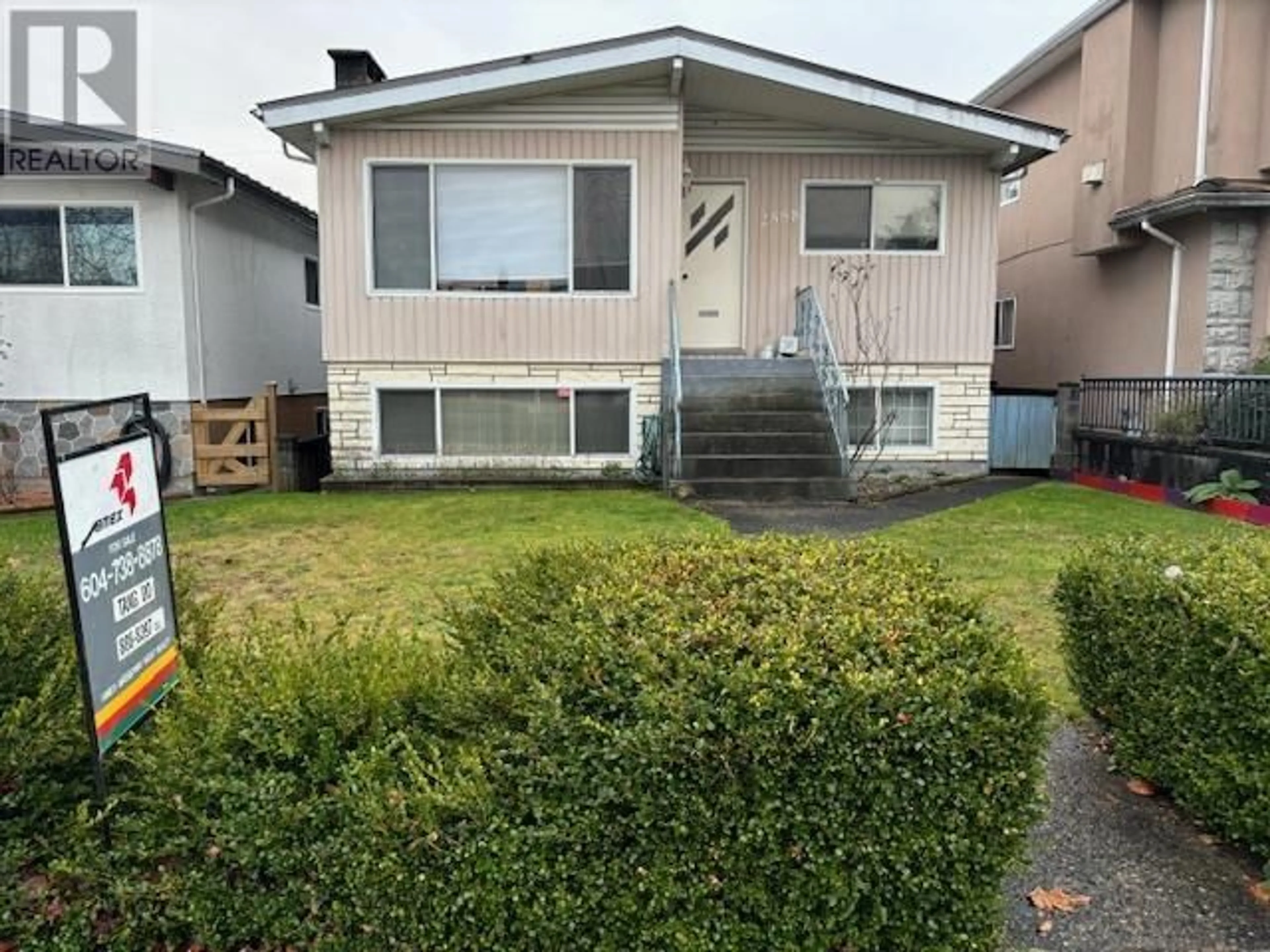 Frontside or backside of a home, the fenced backyard for 2558 E 42ND AVENUE, Vancouver British Columbia V5R2Y1