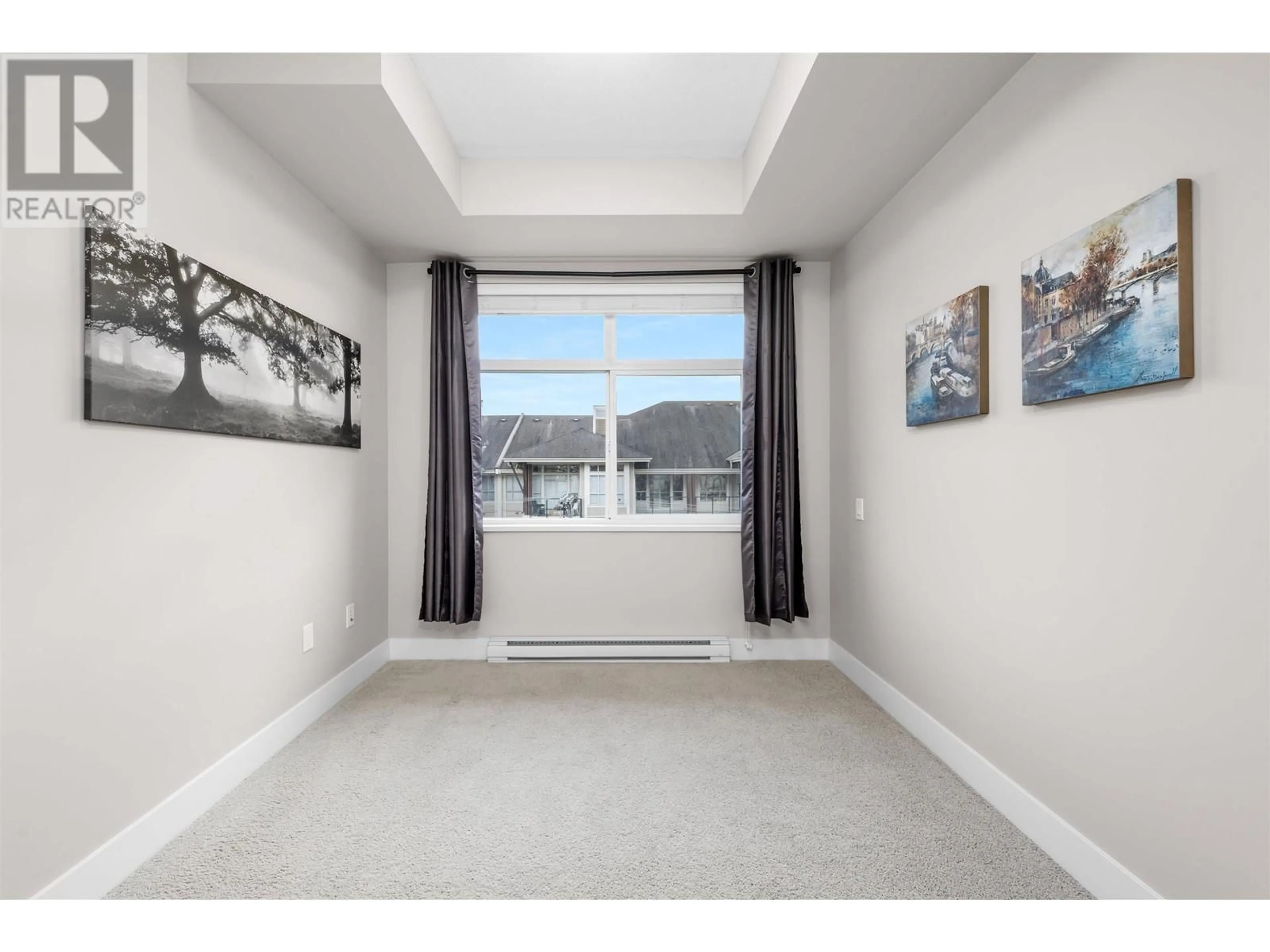 A pic of a room, carpet floors for 402 2495 WILSON AVENUE, Port Coquitlam British Columbia V3C0E4