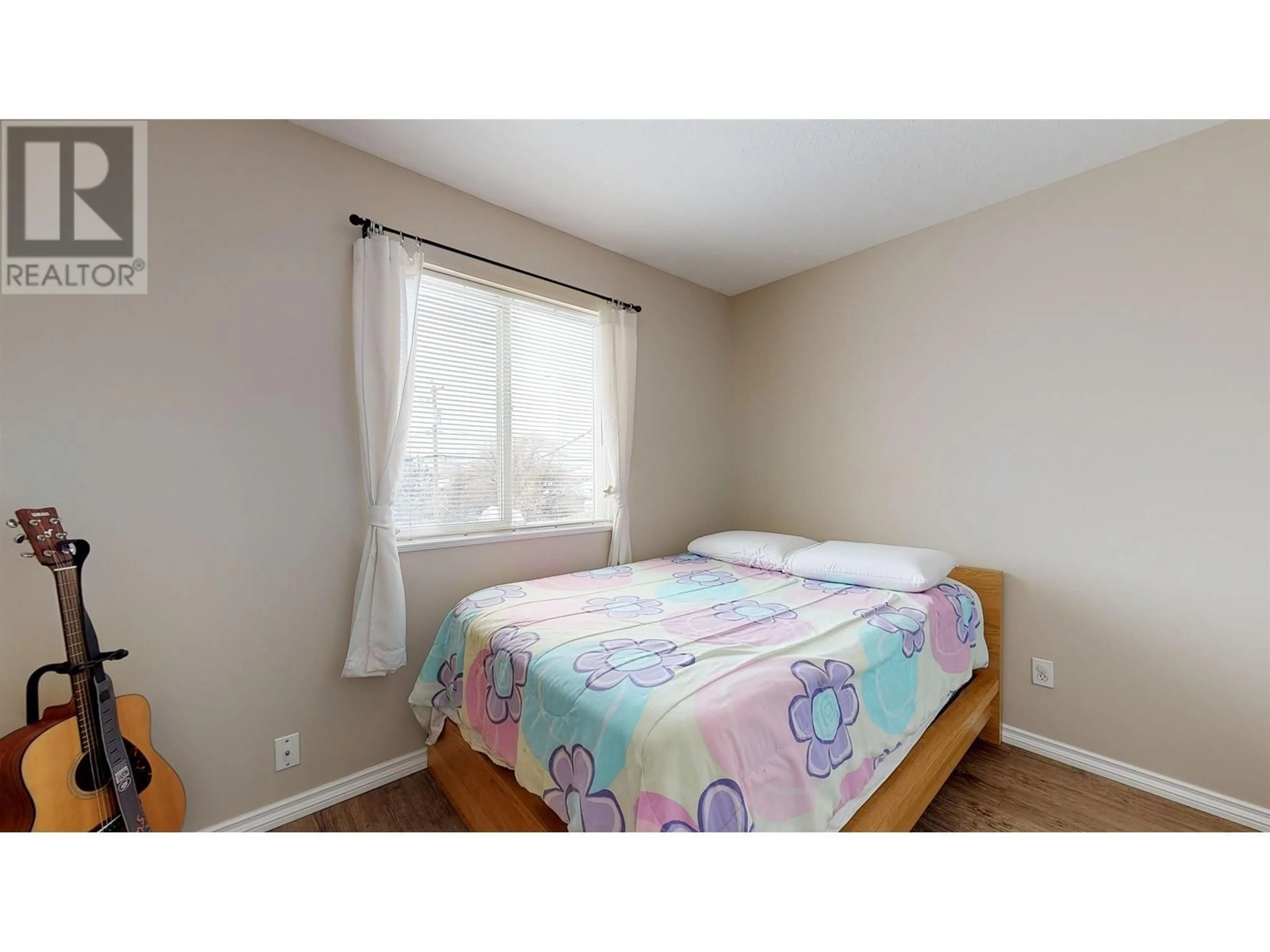 A pic of a room, wood floors for 9212 86 STREET, Fort St. John British Columbia V1J4M7