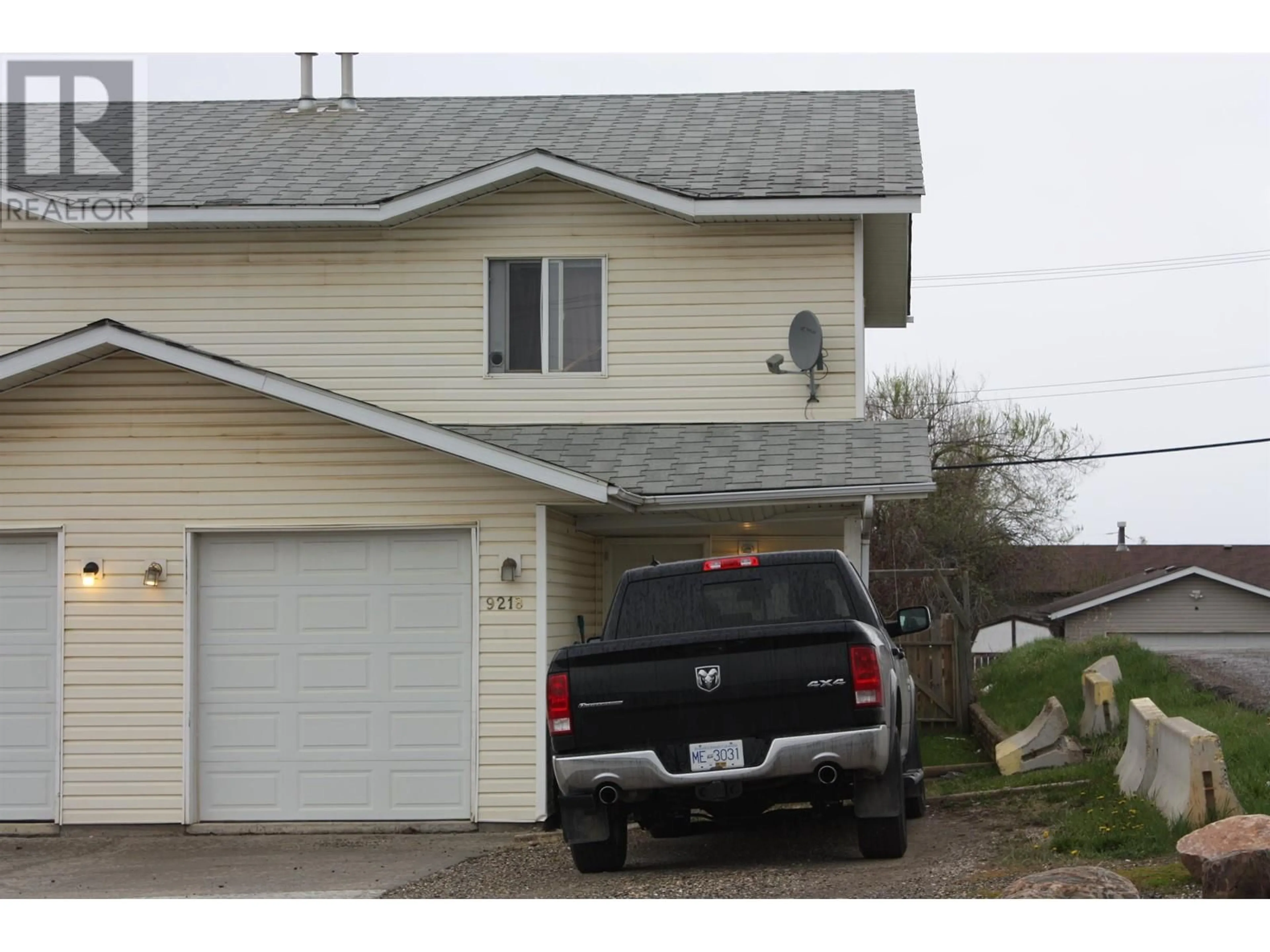 Home with vinyl exterior material, street for 9218 86 STREET, Fort St. John British Columbia V1J4M8