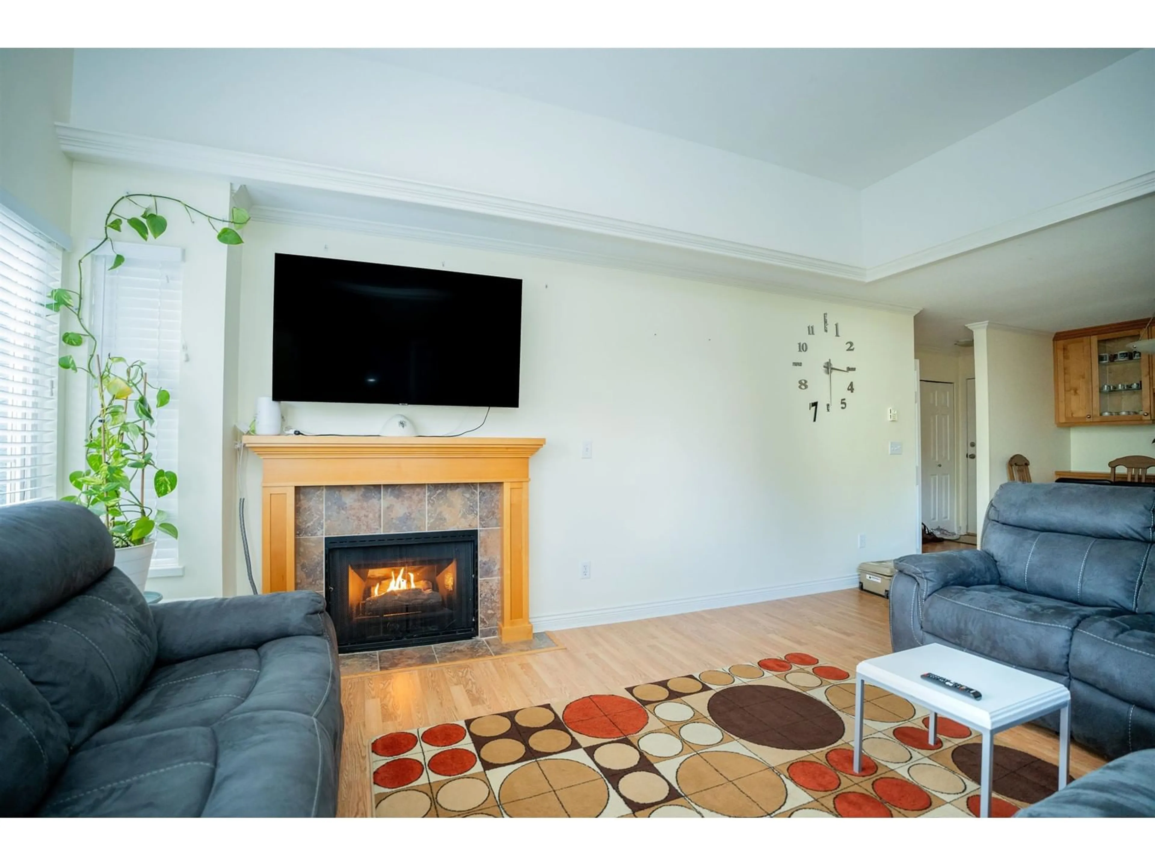 Living room, wood floors for 306 20350 54 AVENUE, Langley British Columbia V3A8J4