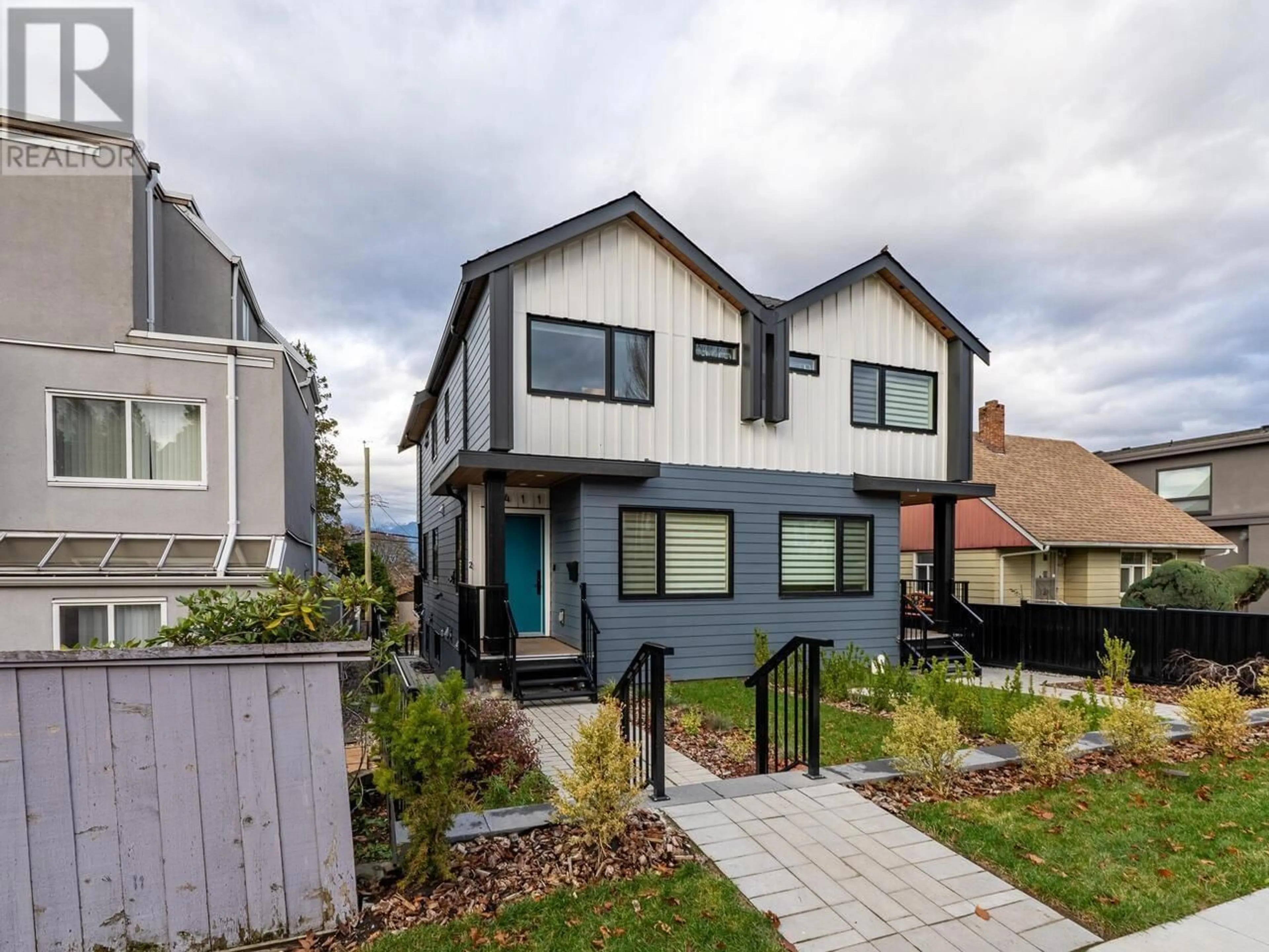 Frontside or backside of a home, the fenced backyard for 3411 ANZIO DRIVE, Vancouver British Columbia V5M4E2