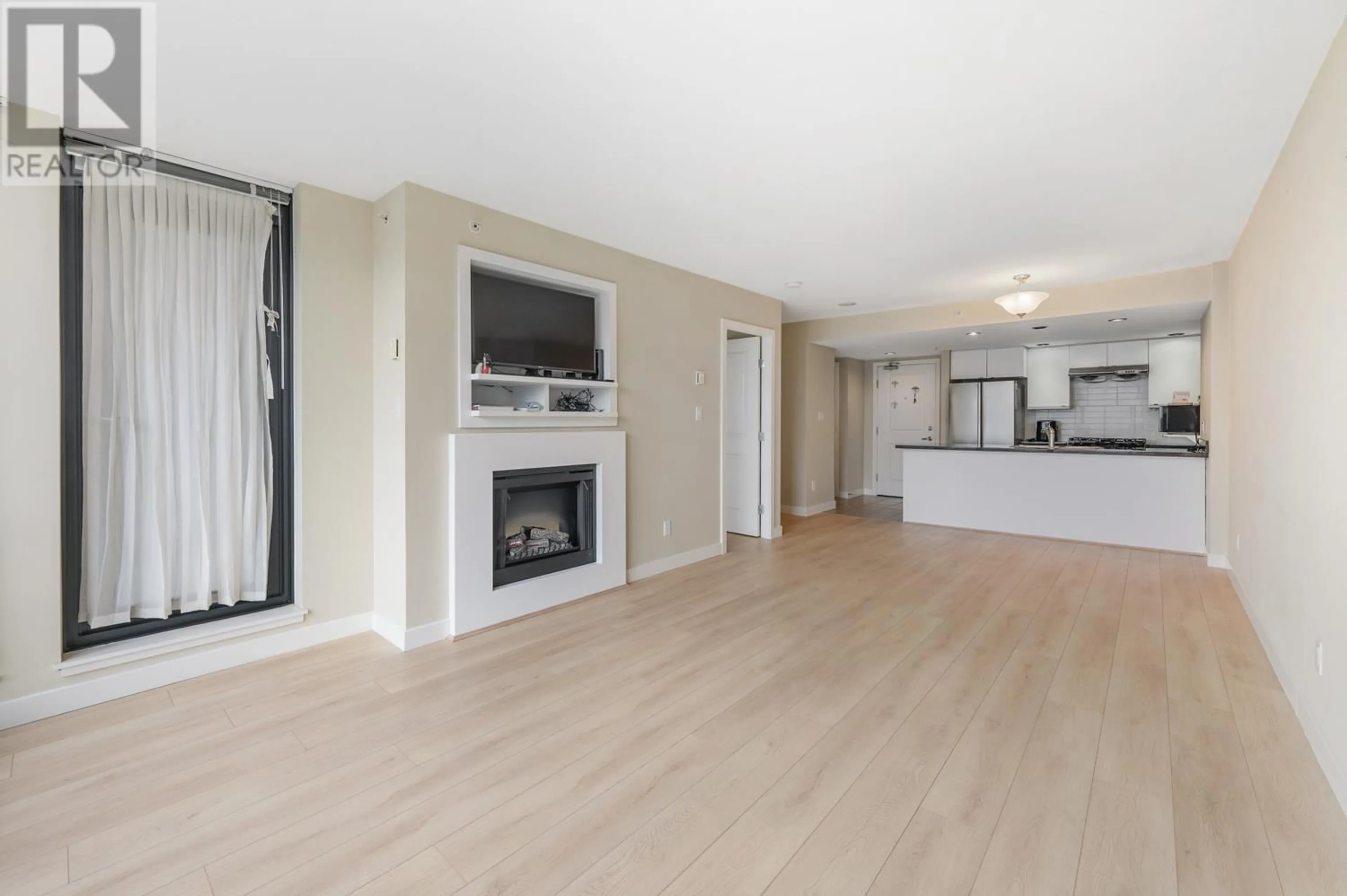 A pic of a room, wood floors for 605 9180 HEMLOCK DRIVE, Richmond British Columbia V6Y4J5