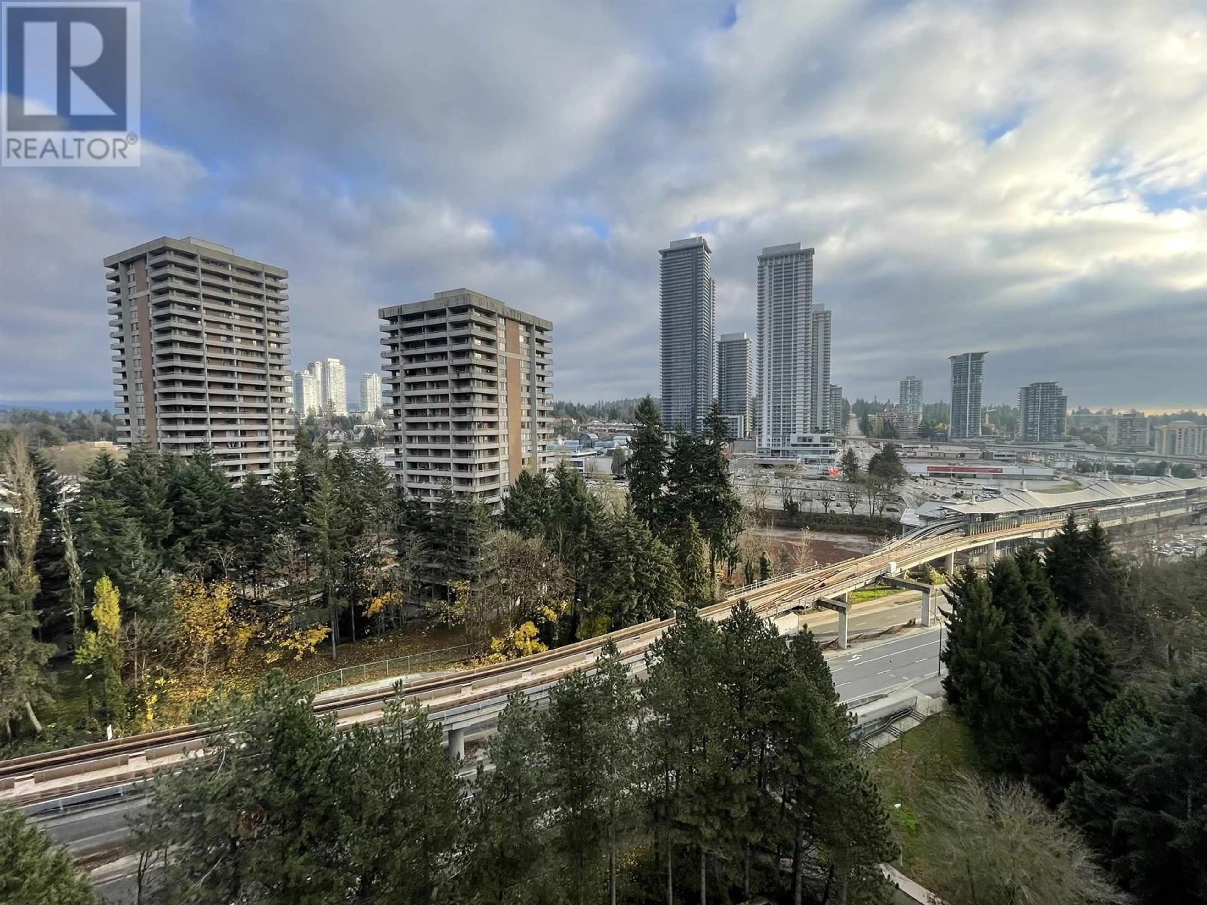 A pic from exterior of the house or condo, the view of city buildings for 1301 3970 CARRIGAN COURT, Burnaby British Columbia V3N4S5