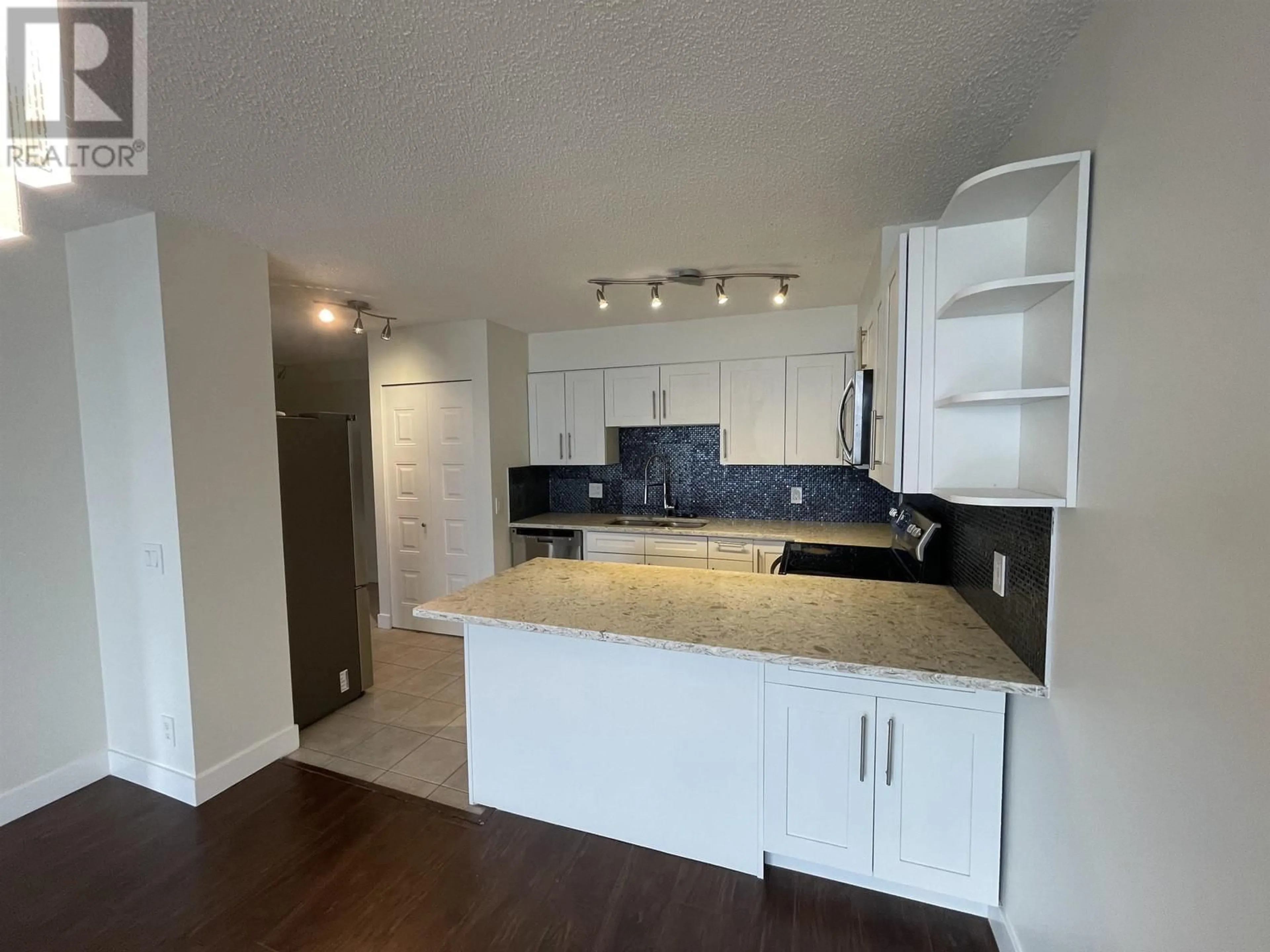 Open concept kitchen for 1301 3970 CARRIGAN COURT, Burnaby British Columbia V3N4S5