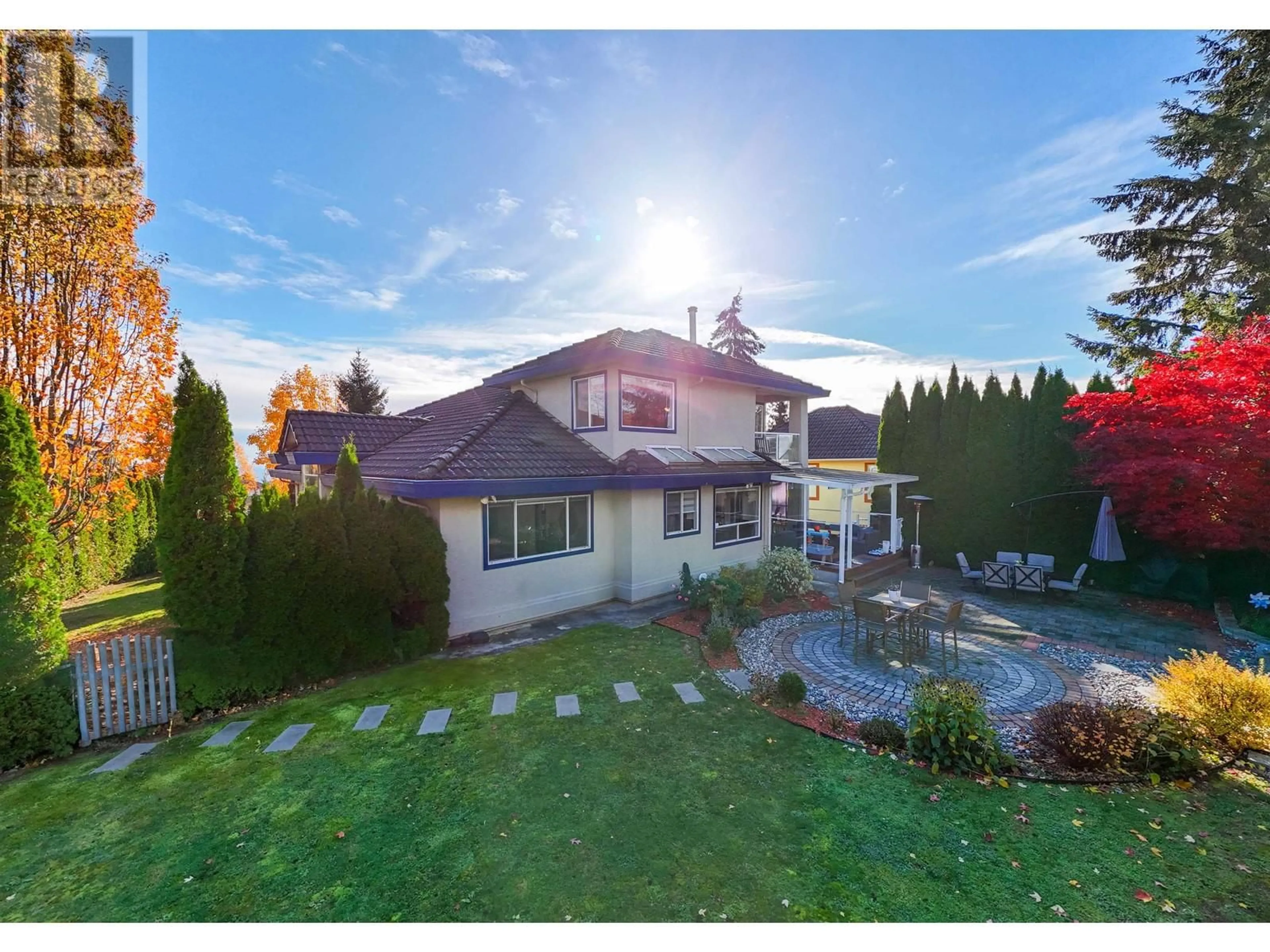 Frontside or backside of a home, the fenced backyard for 1512 EAGLE MOUNTAIN DRIVE, Coquitlam British Columbia V3E2Y6