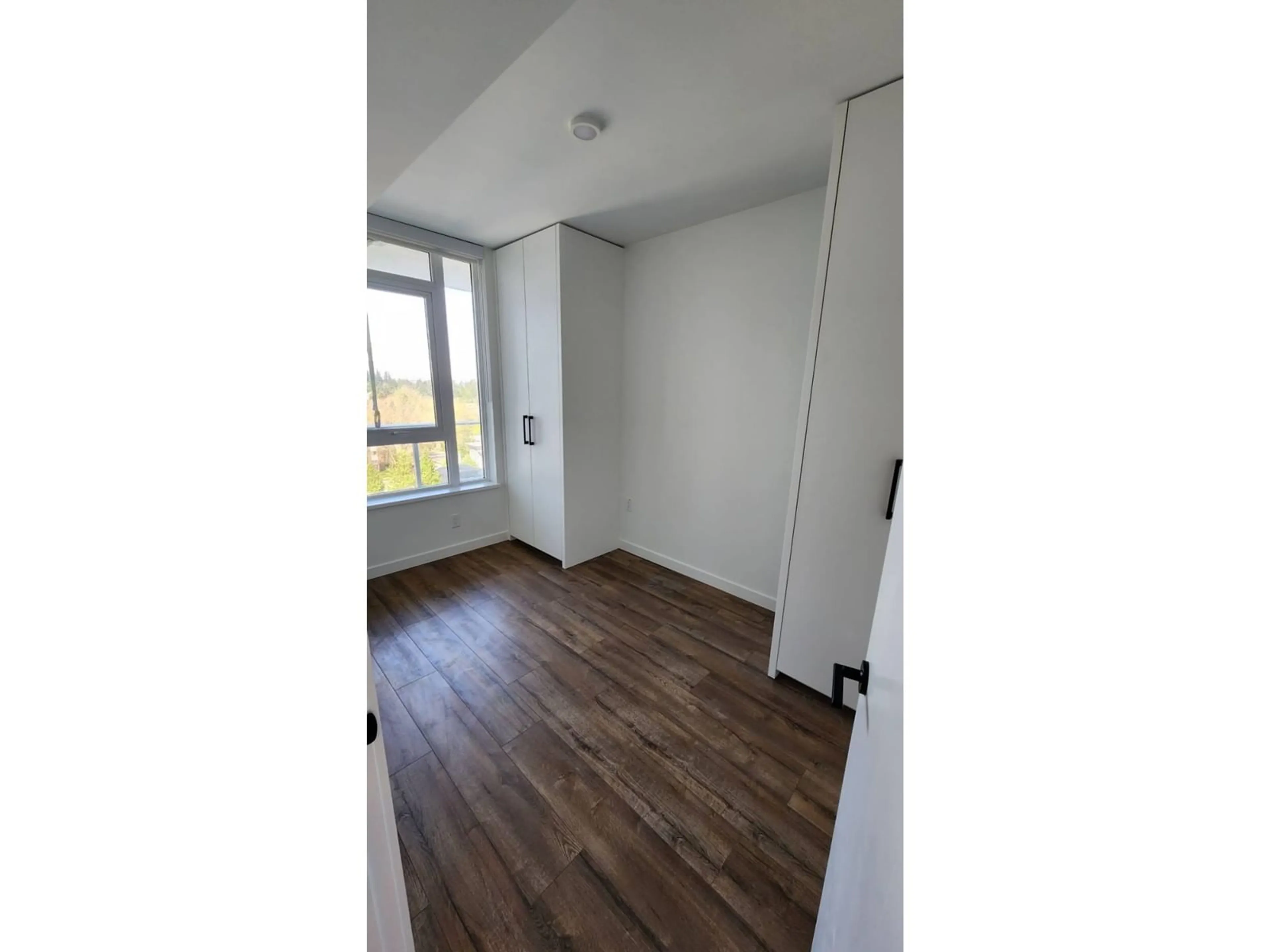 A pic of a room, wood floors for 1101 10448 UNIVERSITY DRIVE, Surrey British Columbia V3T0S7