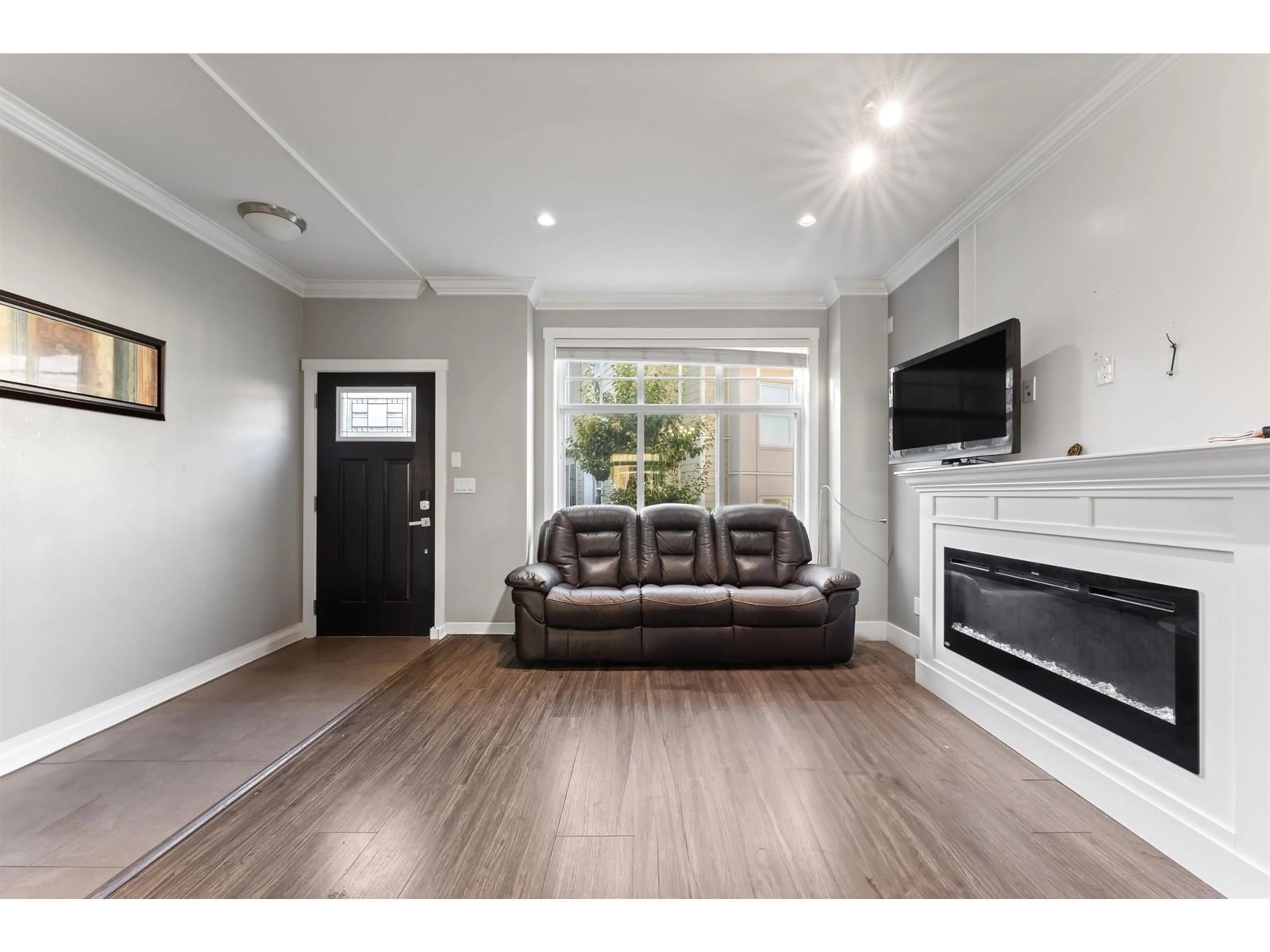 Living room, wood floors for 135 13670 62 AVENUE, Surrey British Columbia V3X0H8