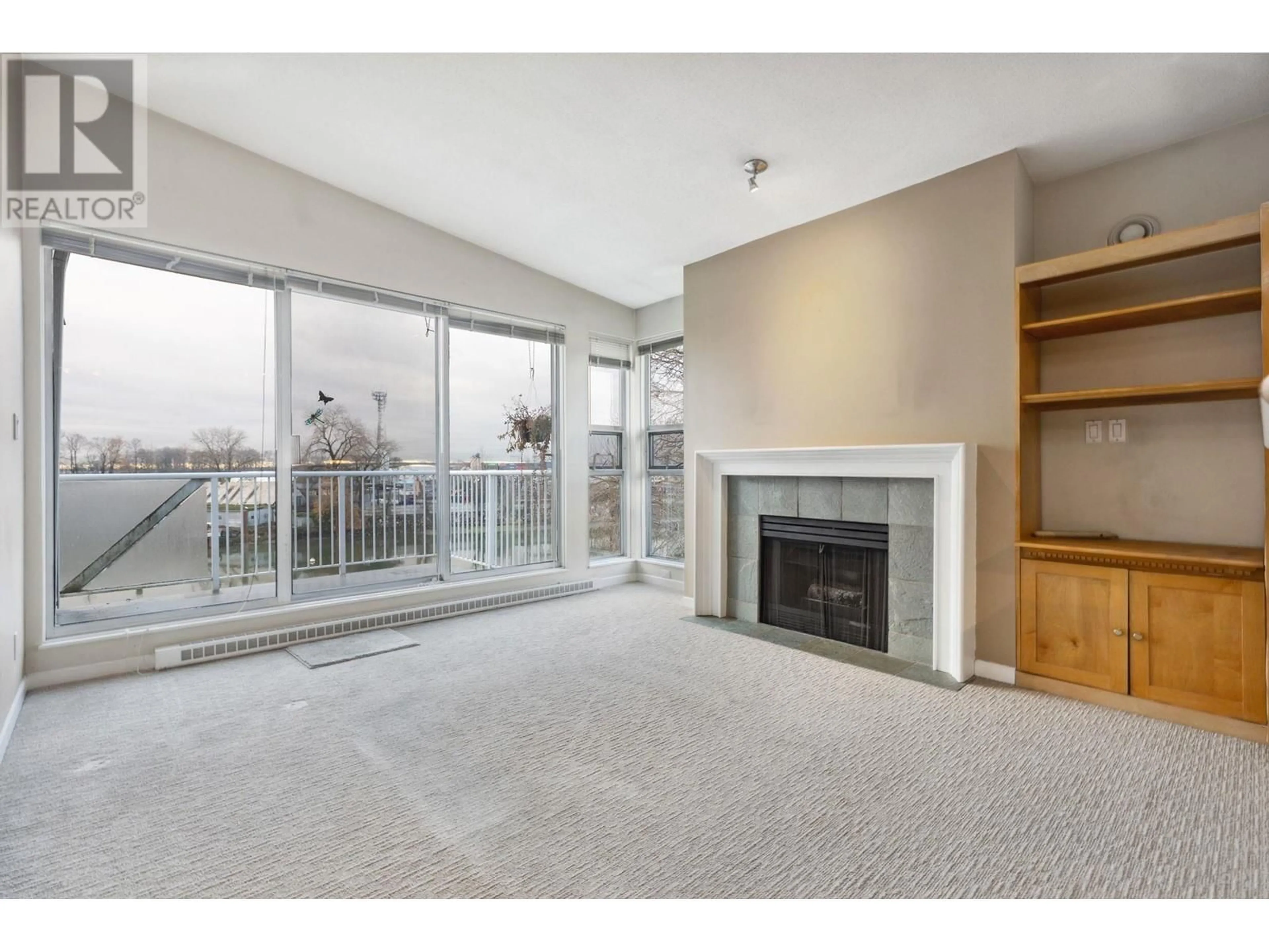 Living room, wood floors for 405 1820 E KENT AVENUE, Vancouver British Columbia V5P2S7