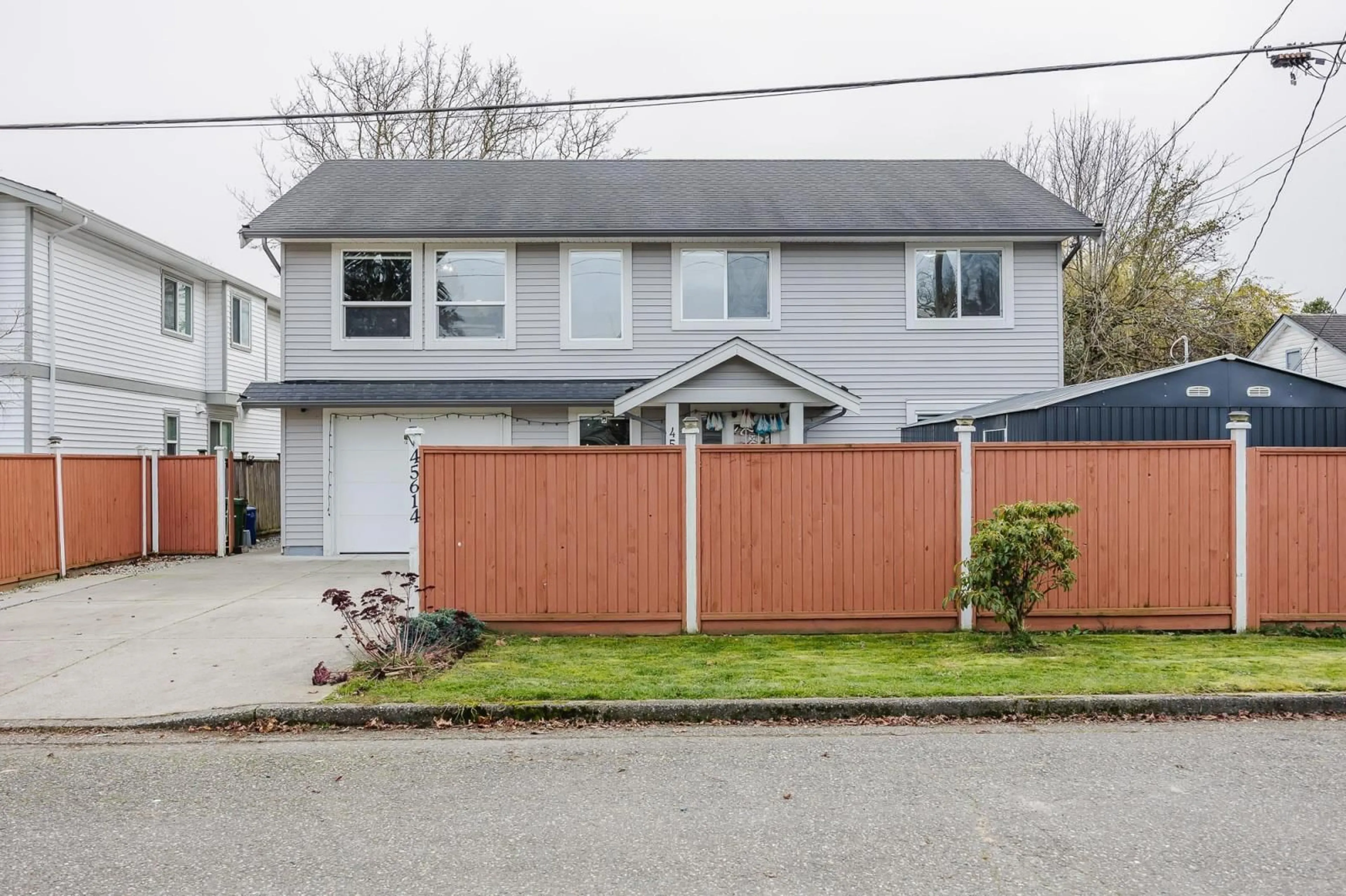 Frontside or backside of a home, the fenced backyard for 45614 HERRON AVENUE, Chilliwack British Columbia V2P3G9