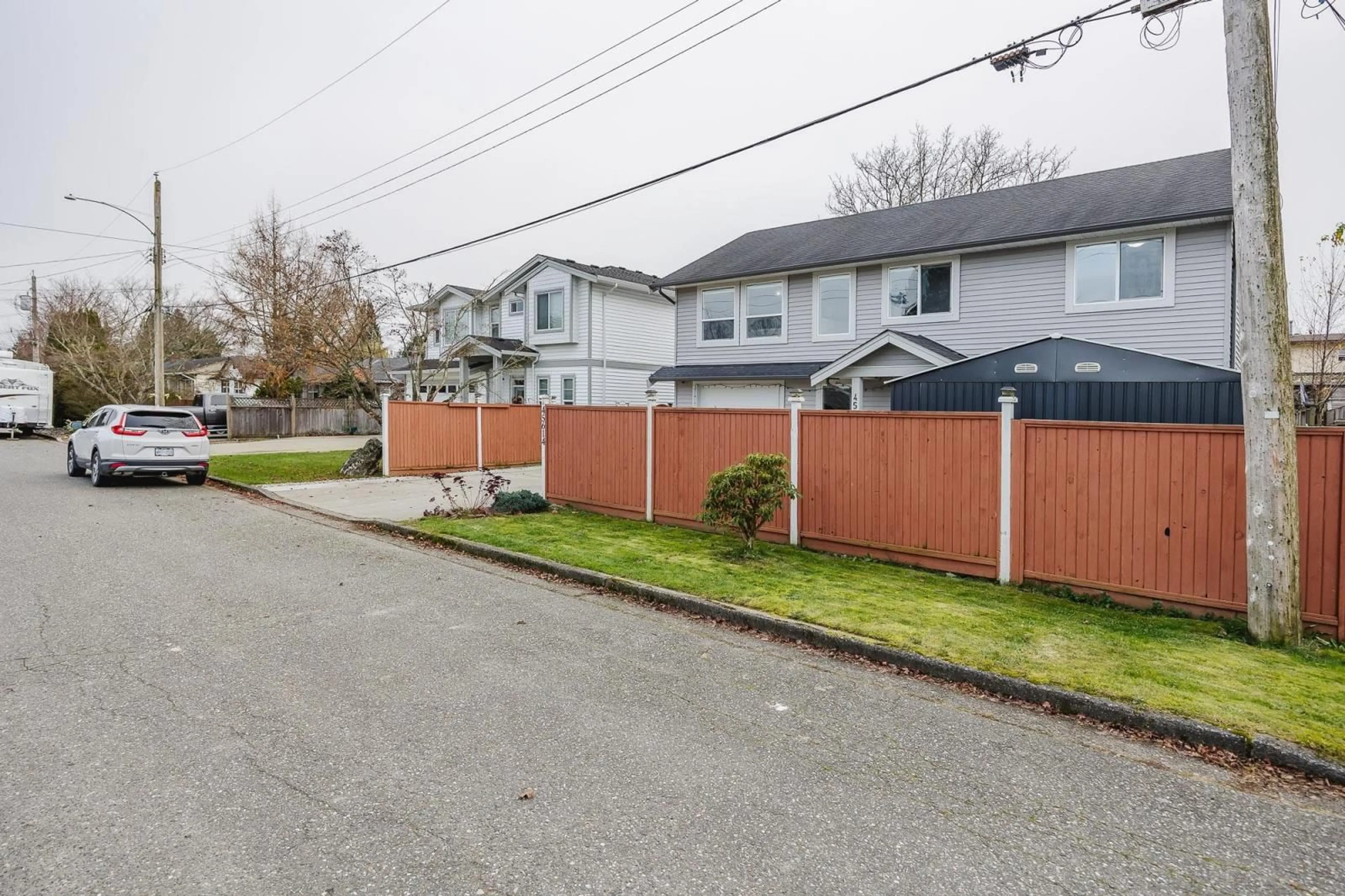 A pic from exterior of the house or condo, the fenced backyard for 45614 HERRON AVENUE, Chilliwack British Columbia V2P3G9