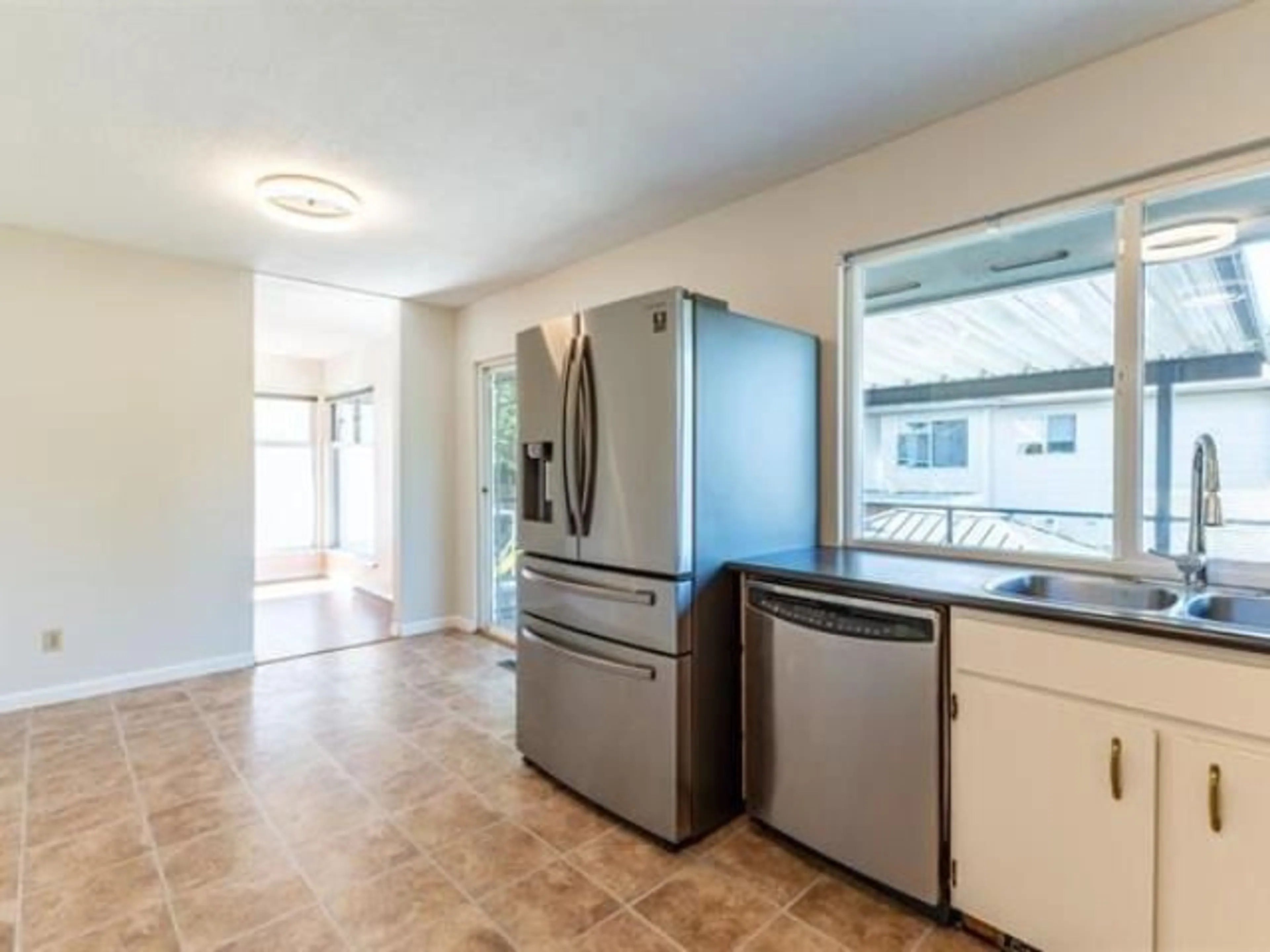 Standard kitchen, wood floors for 10328 JOHNSON WYND, Delta British Columbia V4C2N6