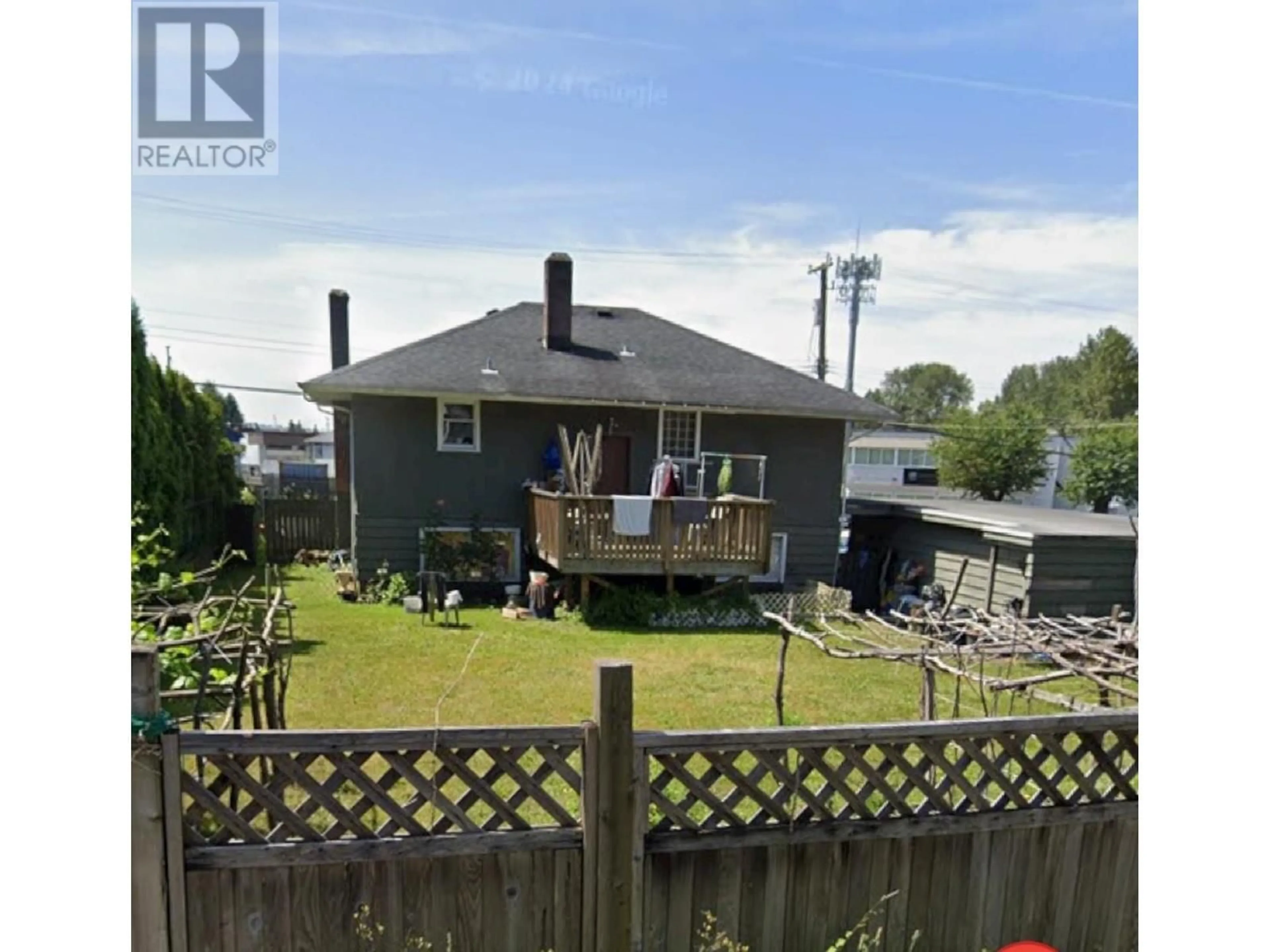 Frontside or backside of a home, the fenced backyard for 1685 BOOTH AVENUE, Coquitlam British Columbia V3K1B8