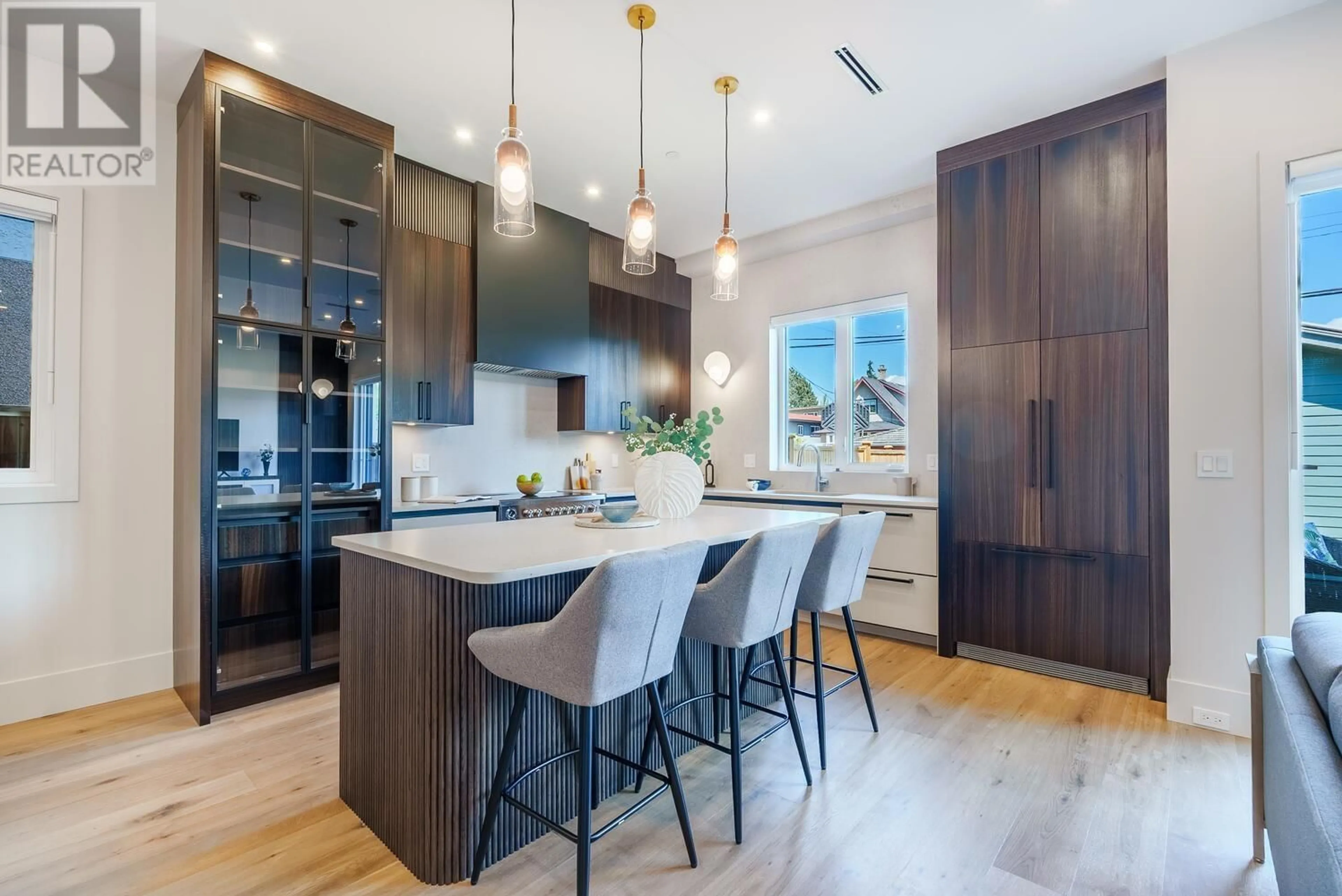 Contemporary kitchen, wood floors for 745 E 39TH AVENUE, Vancouver British Columbia V5W1K5