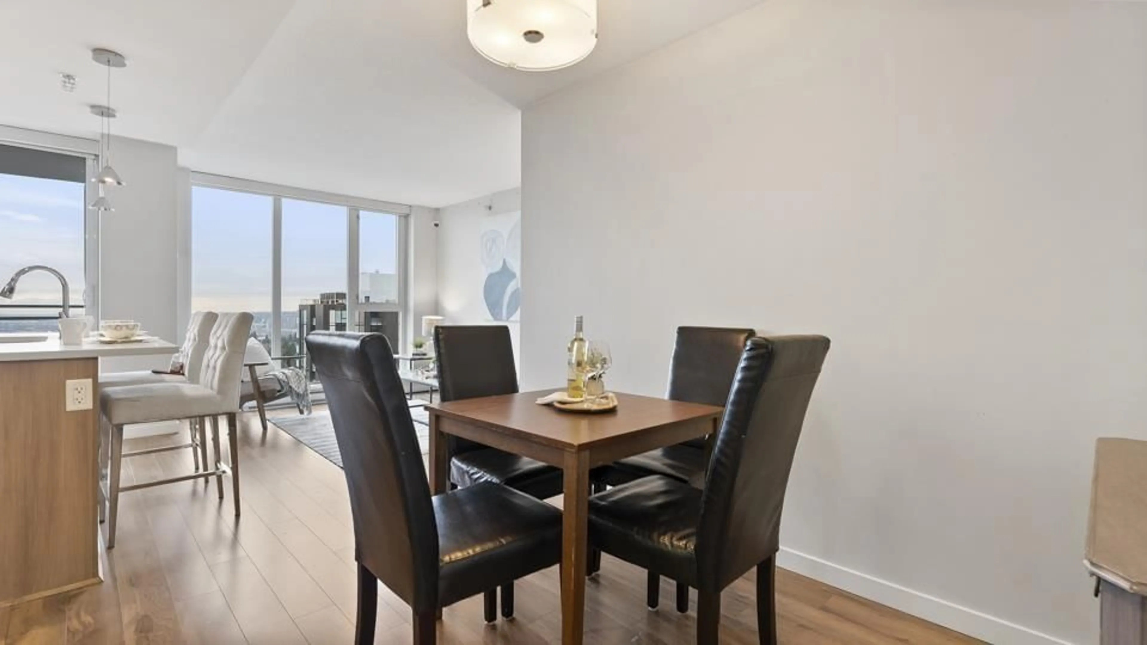 Dining room, wood floors, mountain for 3201 13325 102A AVENUE, Surrey British Columbia V3T0J5