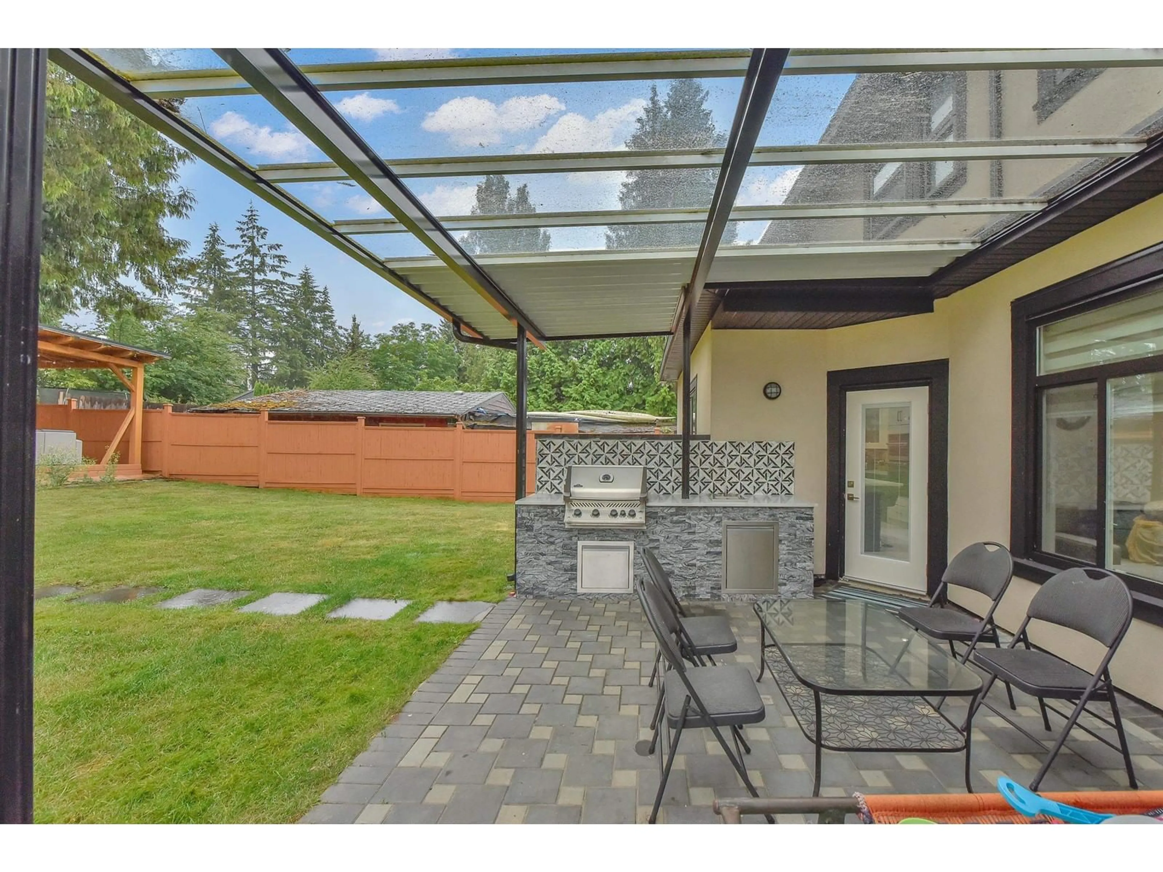 Patio, the fenced backyard for 10266 126 STREET, Surrey British Columbia V3V5E7