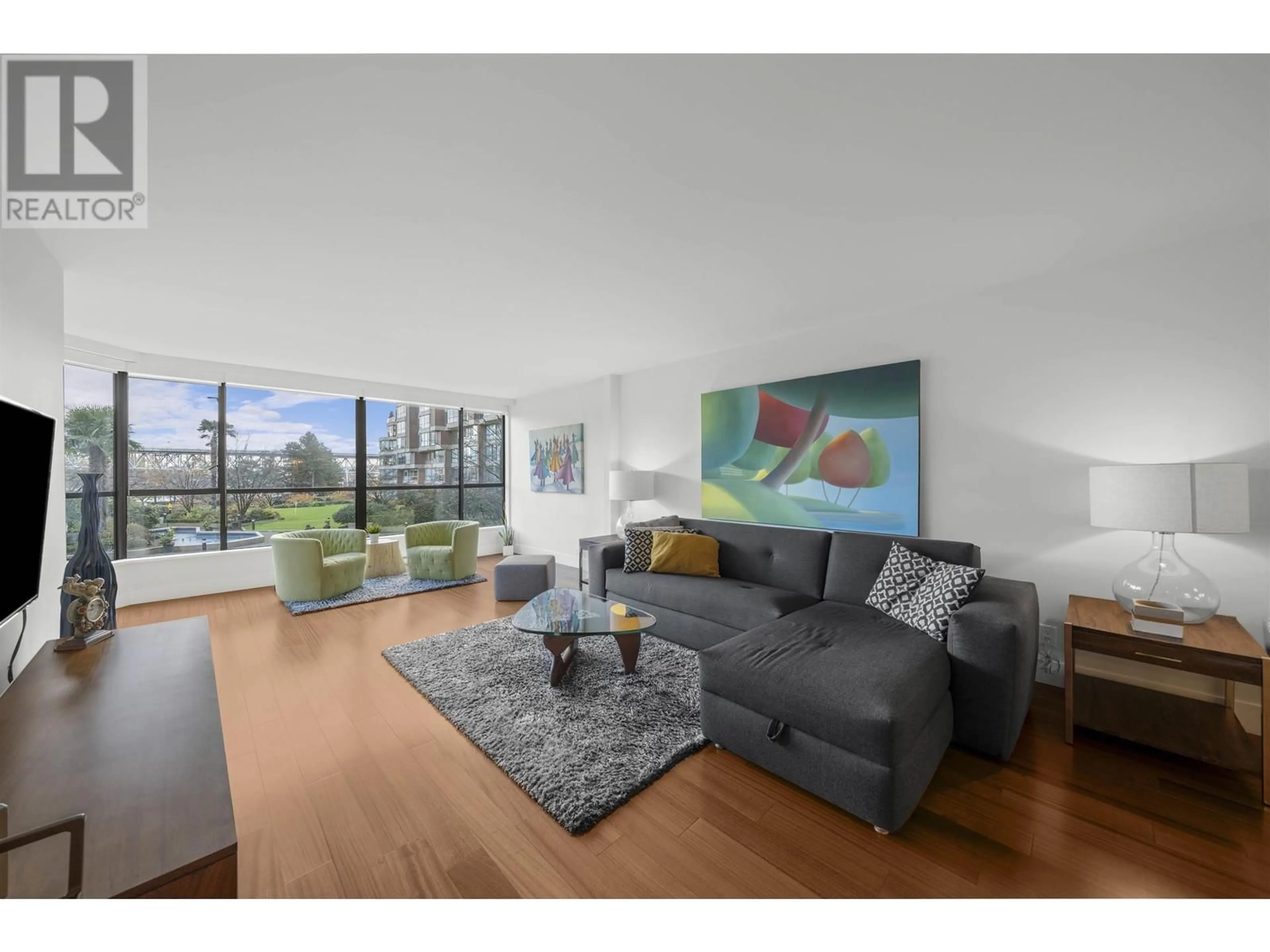 Living room, wood floors for 104 1470 PENNYFARTHING DRIVE, Vancouver British Columbia V6J4Y2