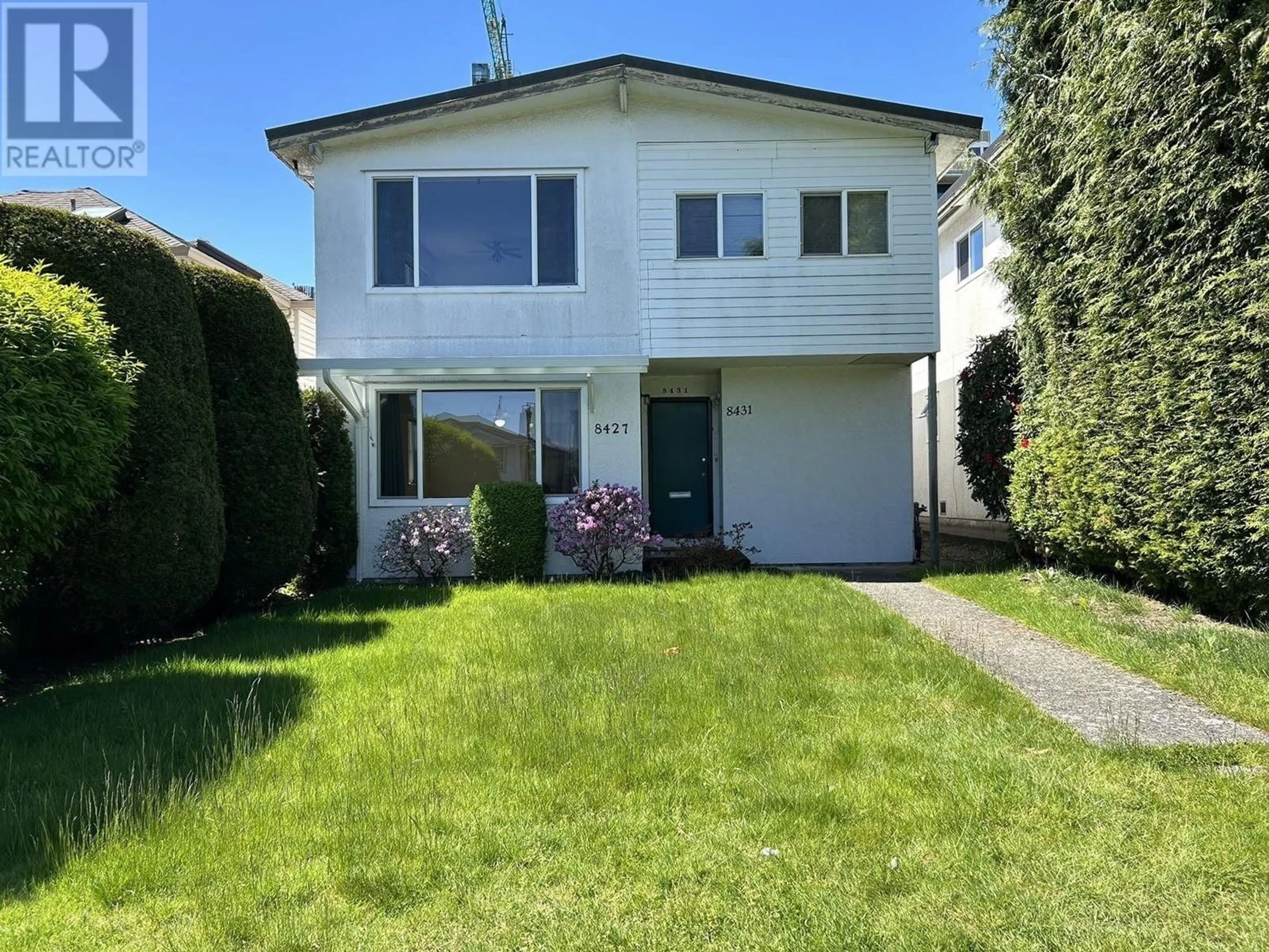 Home with vinyl exterior material, street for 8427- - 8431 SHAUGHNESSY STREET, Vancouver British Columbia V6P3Y1