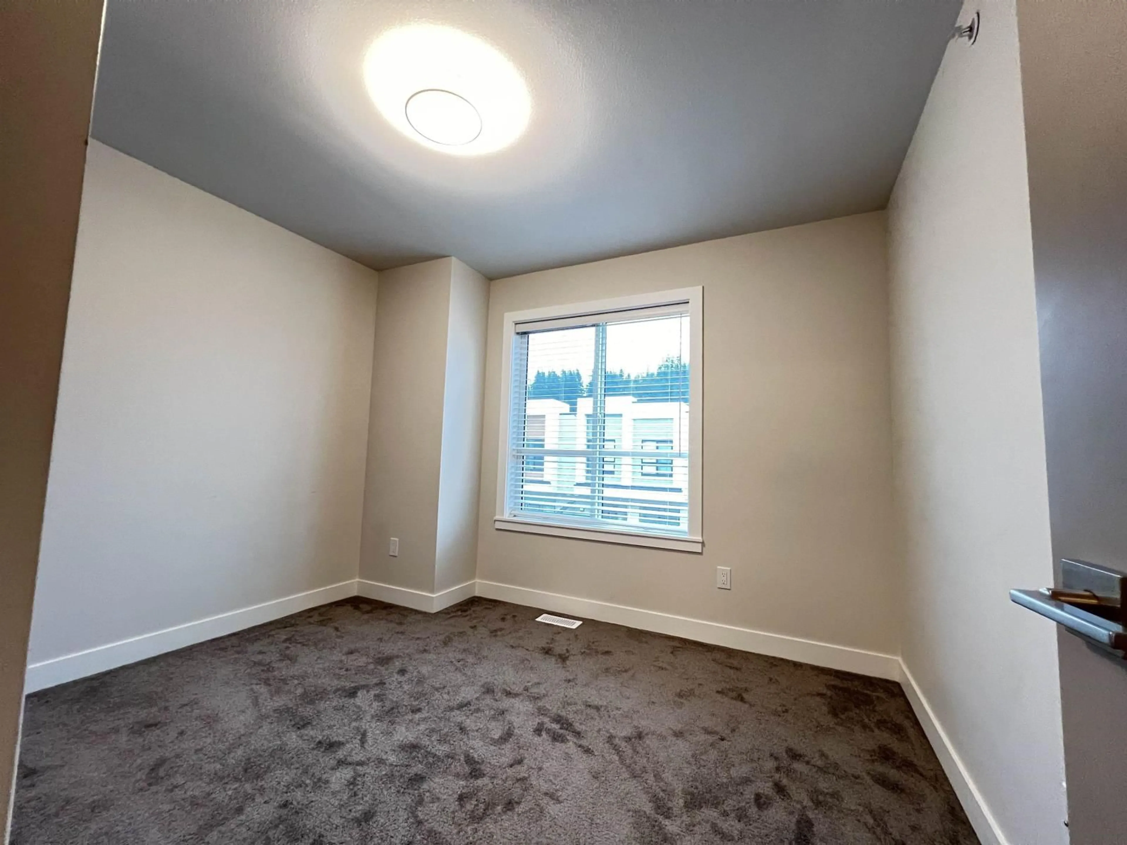 A pic of a room, carpet floors for 205 46150 THOMAS ROAD, Chilliwack British Columbia V2R6H3