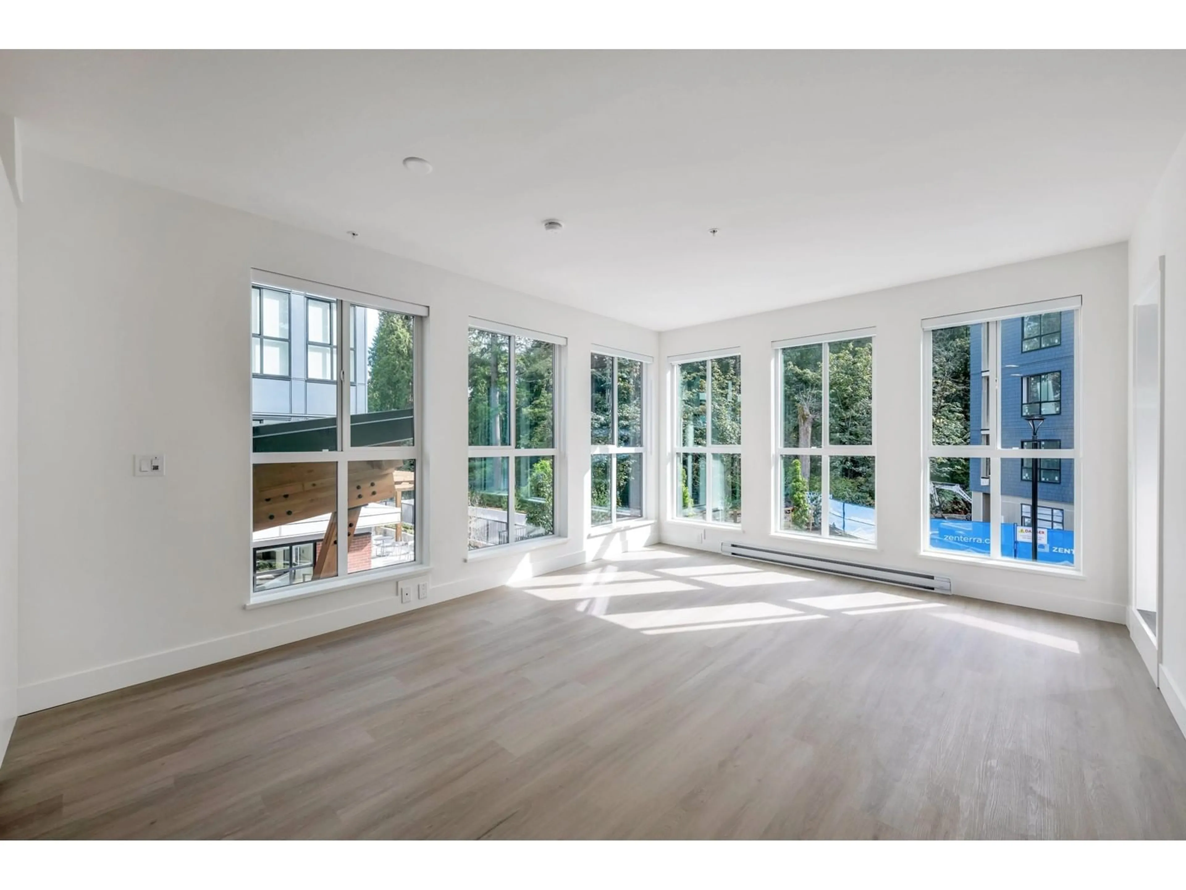 A pic of a room, wood floors for 212 3528 146A STREET, Surrey British Columbia V4P0H4