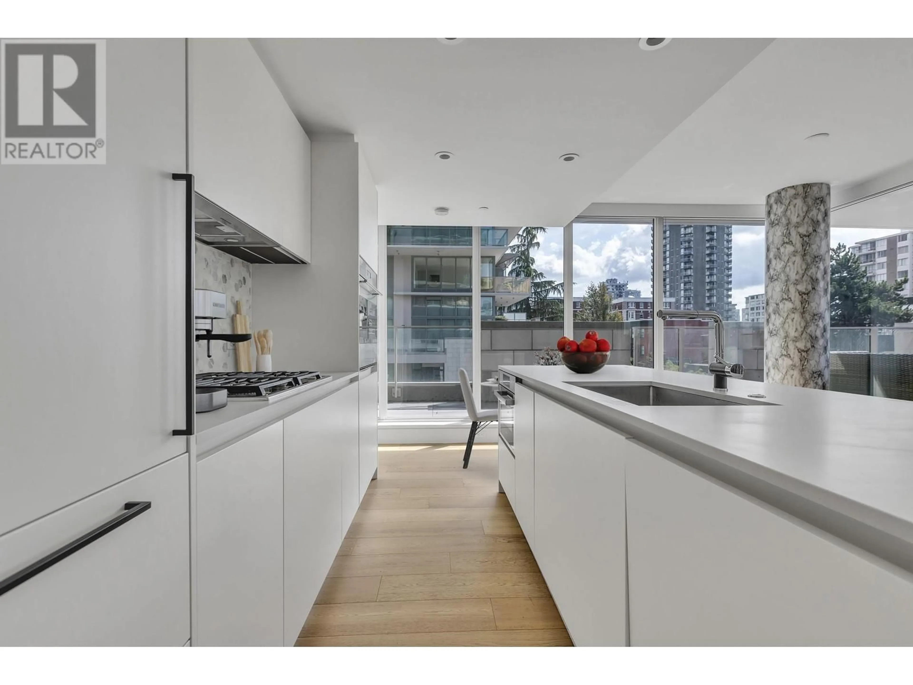 Contemporary kitchen, wood floors for 501 1180 BROUGHTON STREET, Vancouver British Columbia V6G2B1