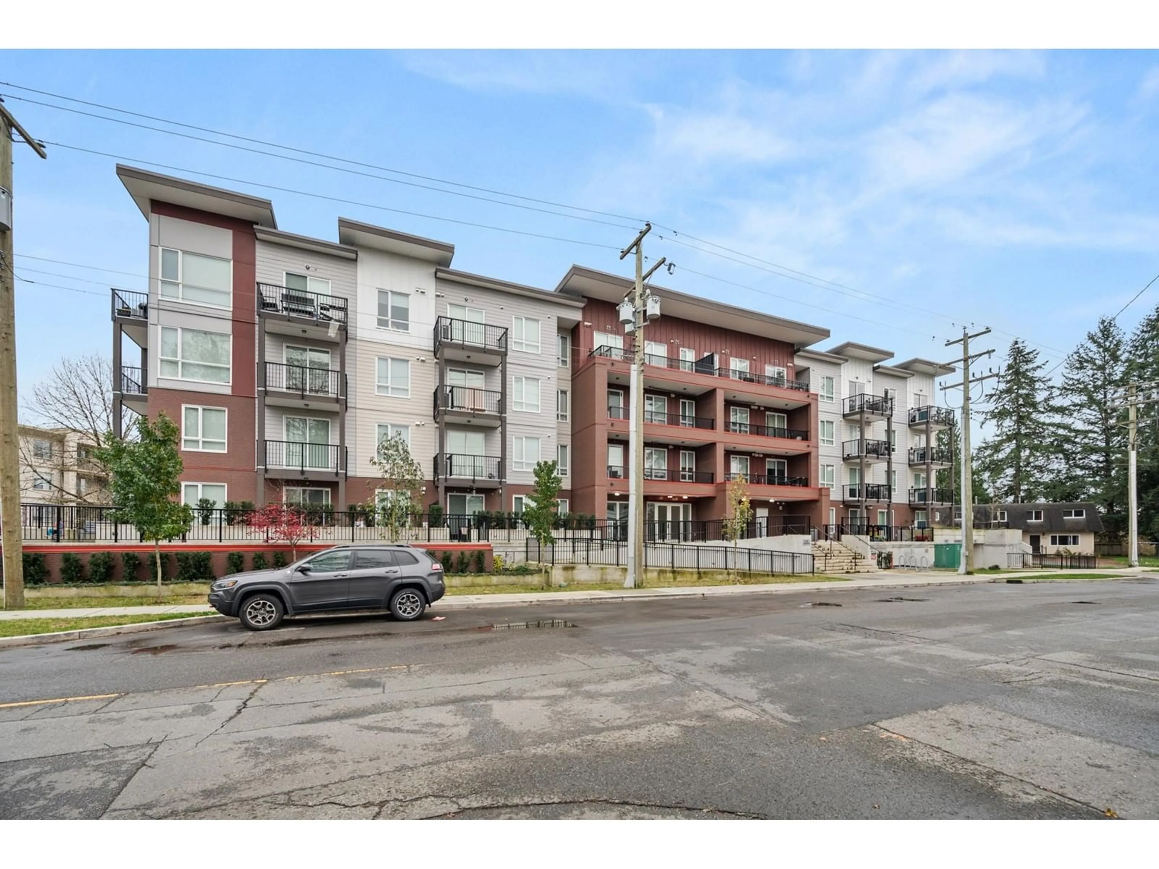 A pic from exterior of the house or condo, the street view for 401 5420 208 STREET, Langley British Columbia V3A2J9