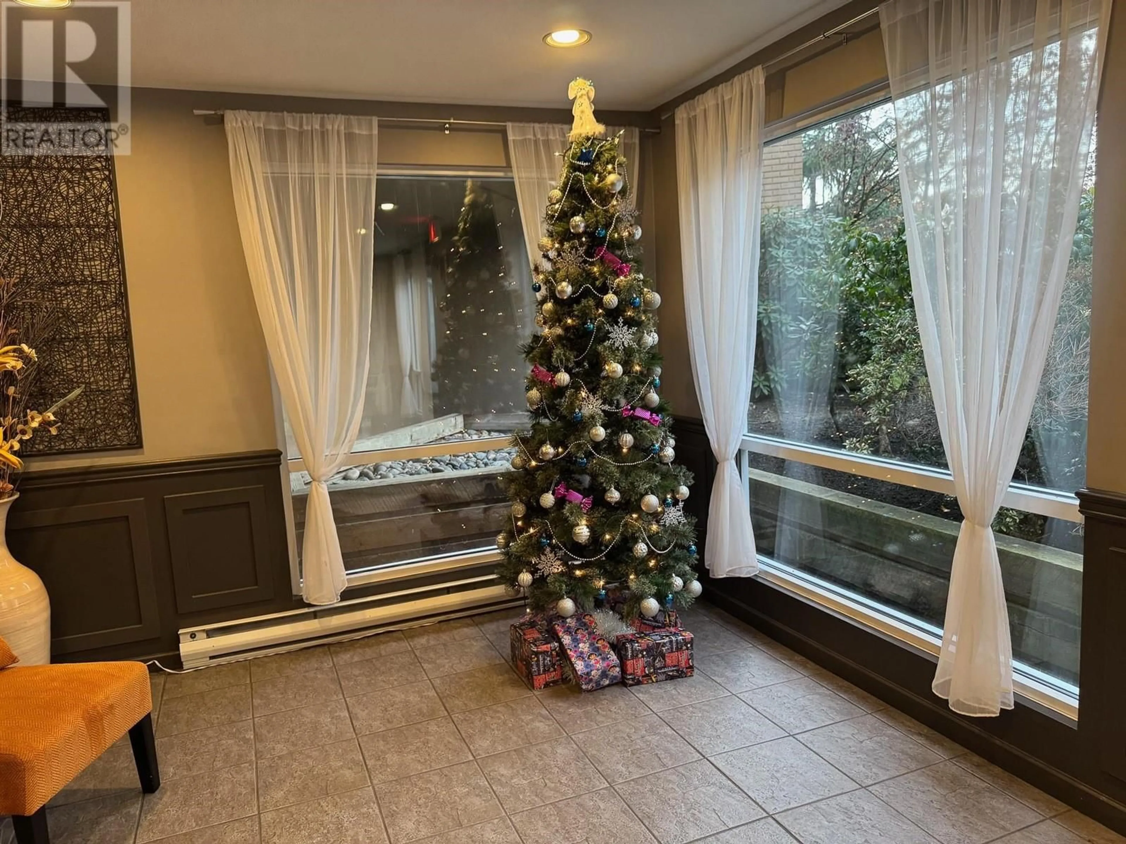 A pic of a room, not visible floor for 322 2551 PARKVIEW LANE, Port Coquitlam British Columbia V3C6J8