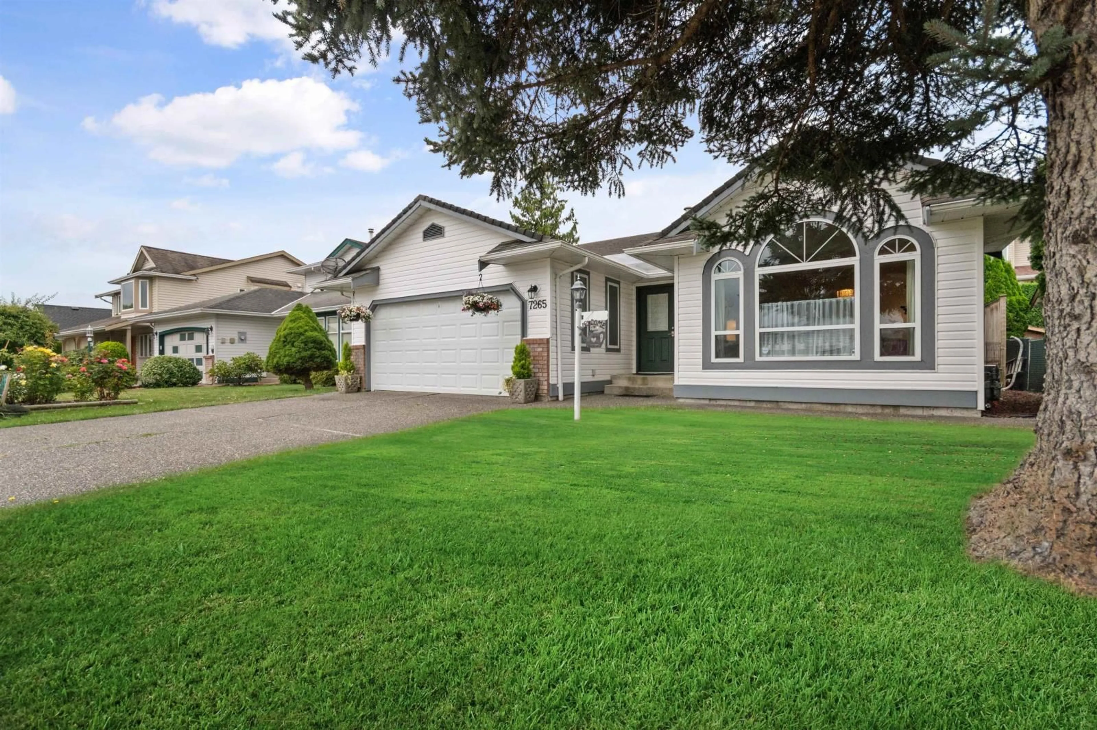 Frontside or backside of a home, cottage for 7265 MEADOWLARK STREET, Chilliwack British Columbia V2R2X1