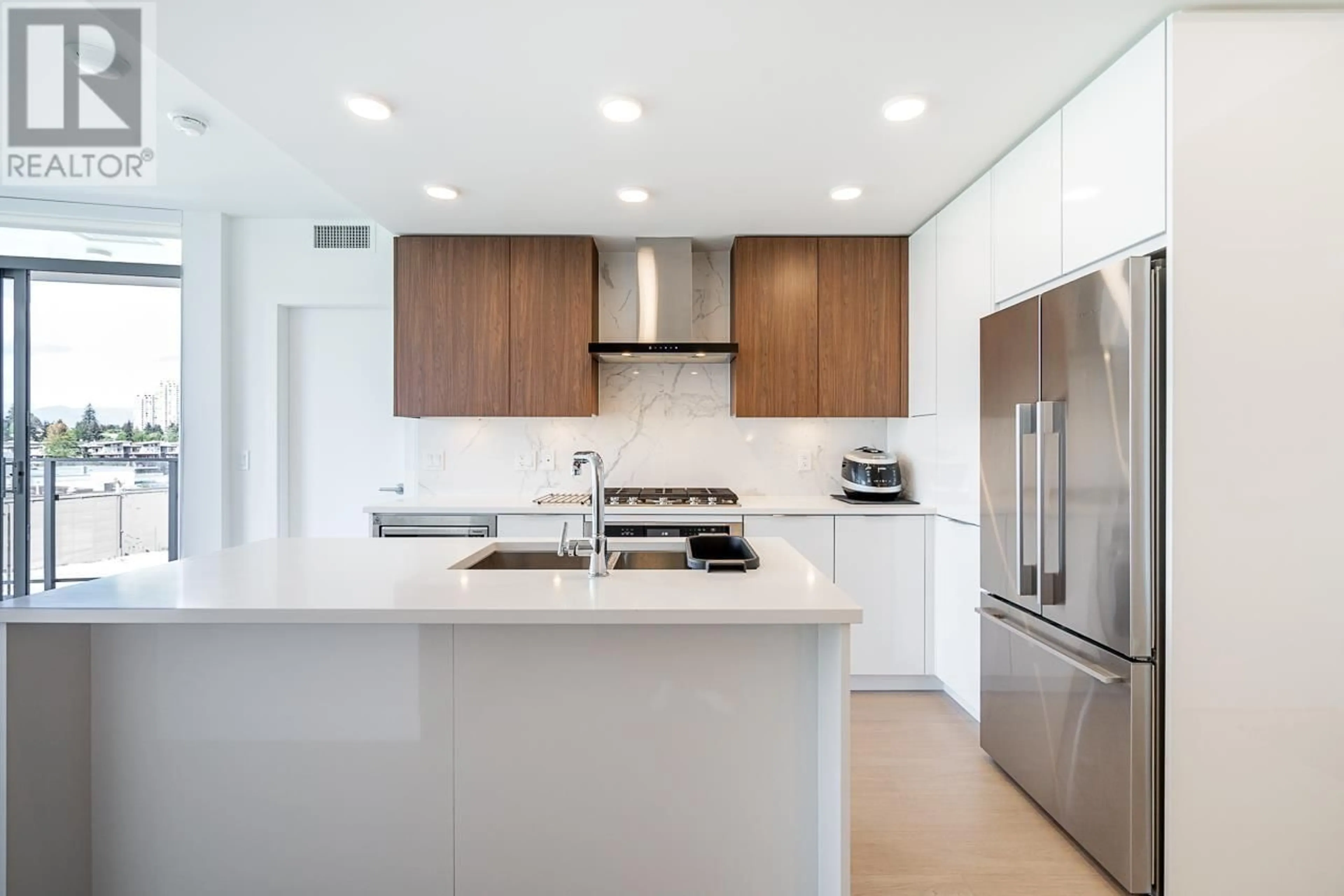 Contemporary kitchen, wood floors for 402 7683 PARK CRESCENT, Burnaby British Columbia V3N0J4