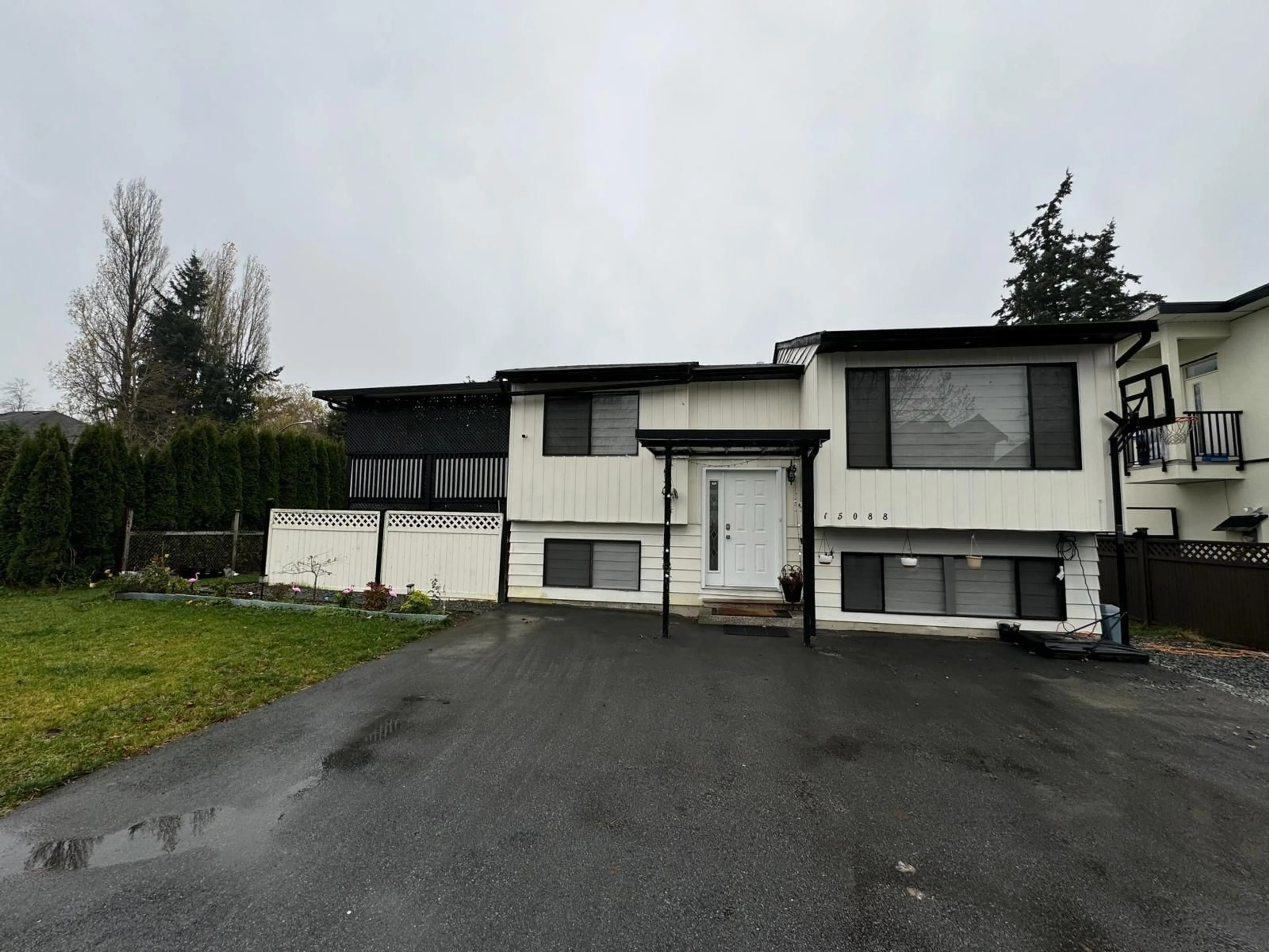 Frontside or backside of a home, the front or back of building for 15088 88A AVENUE, Surrey British Columbia V3R6W9