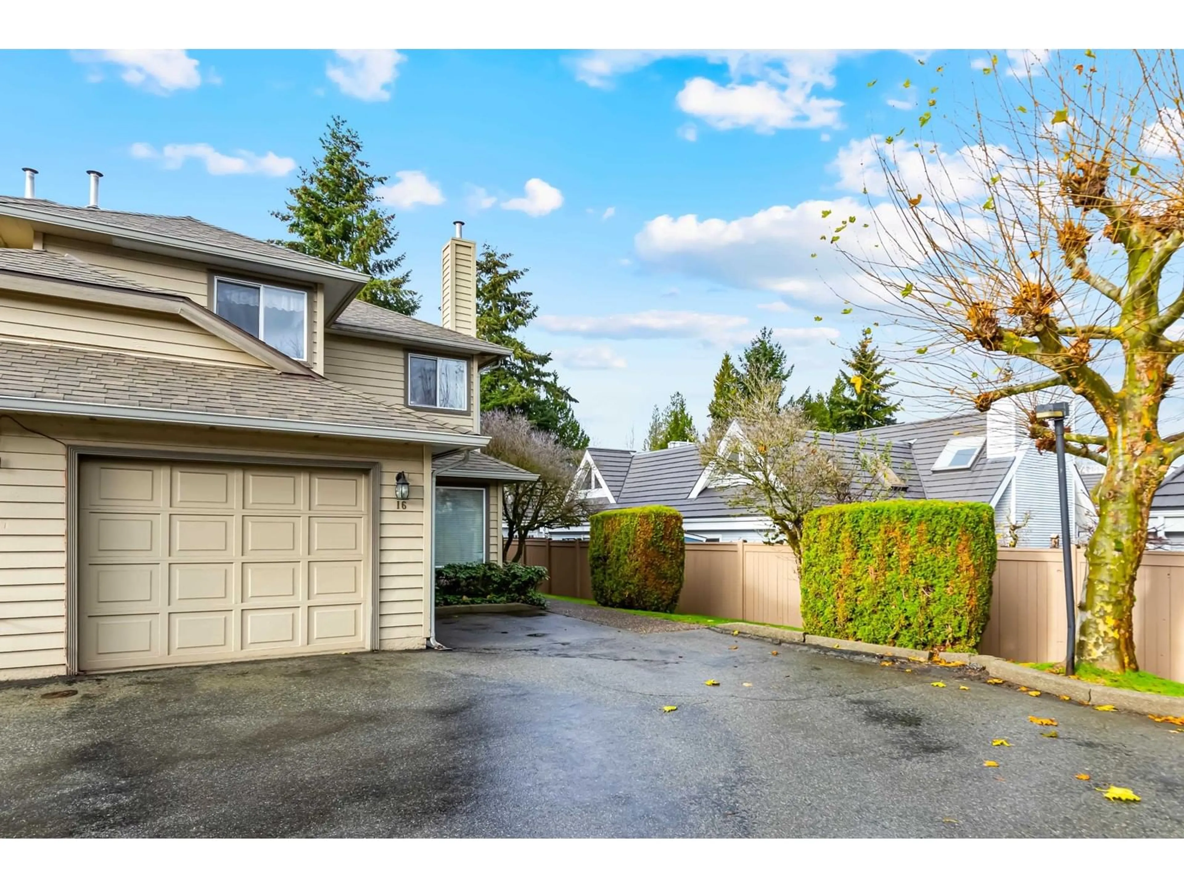 A pic from exterior of the house or condo, the fenced backyard for 16 9727 152B STREET, Surrey British Columbia V3R0G5