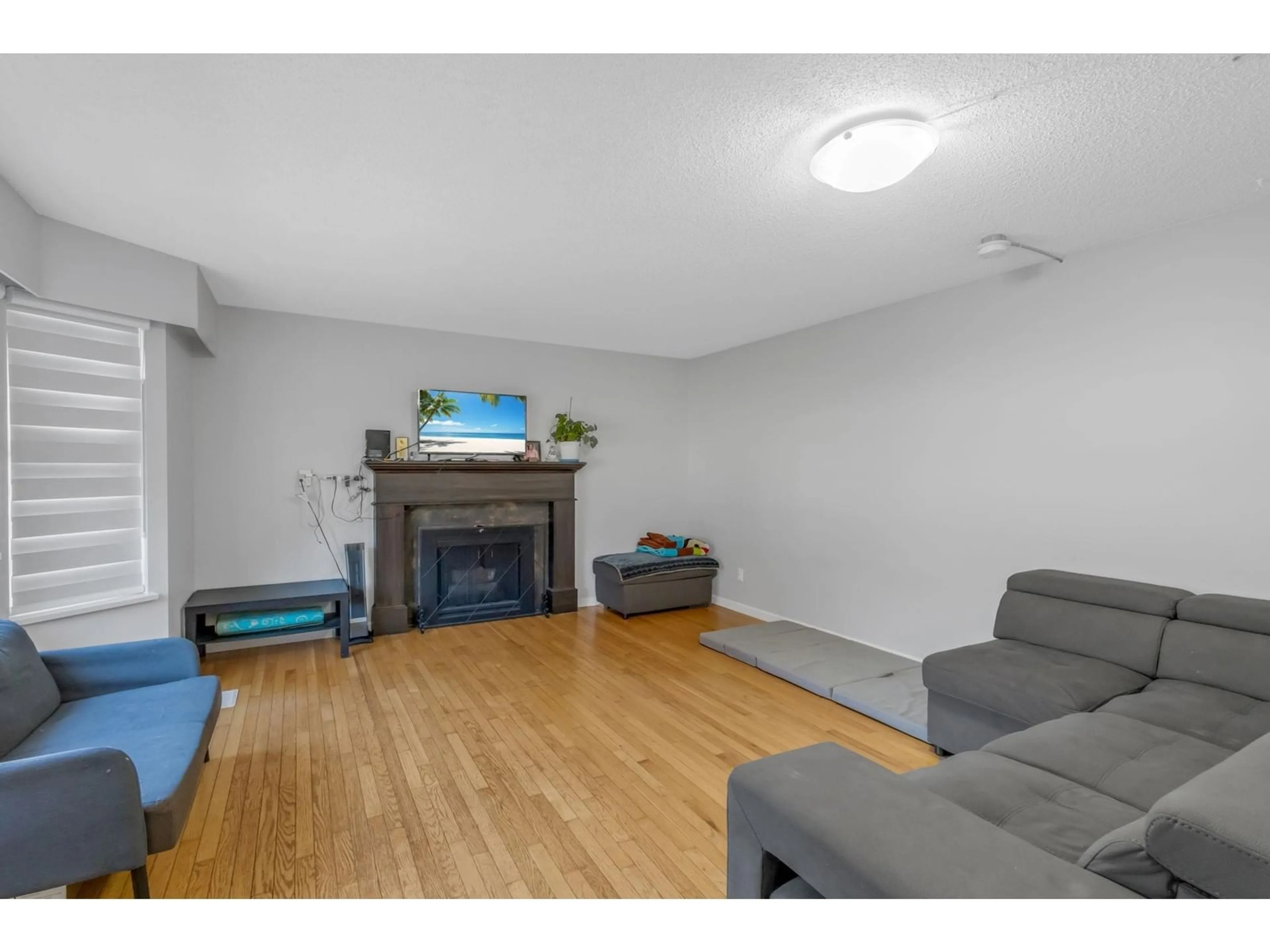 A pic of a room, wood floors for 4084 207A STREET, Langley British Columbia V3A2G6