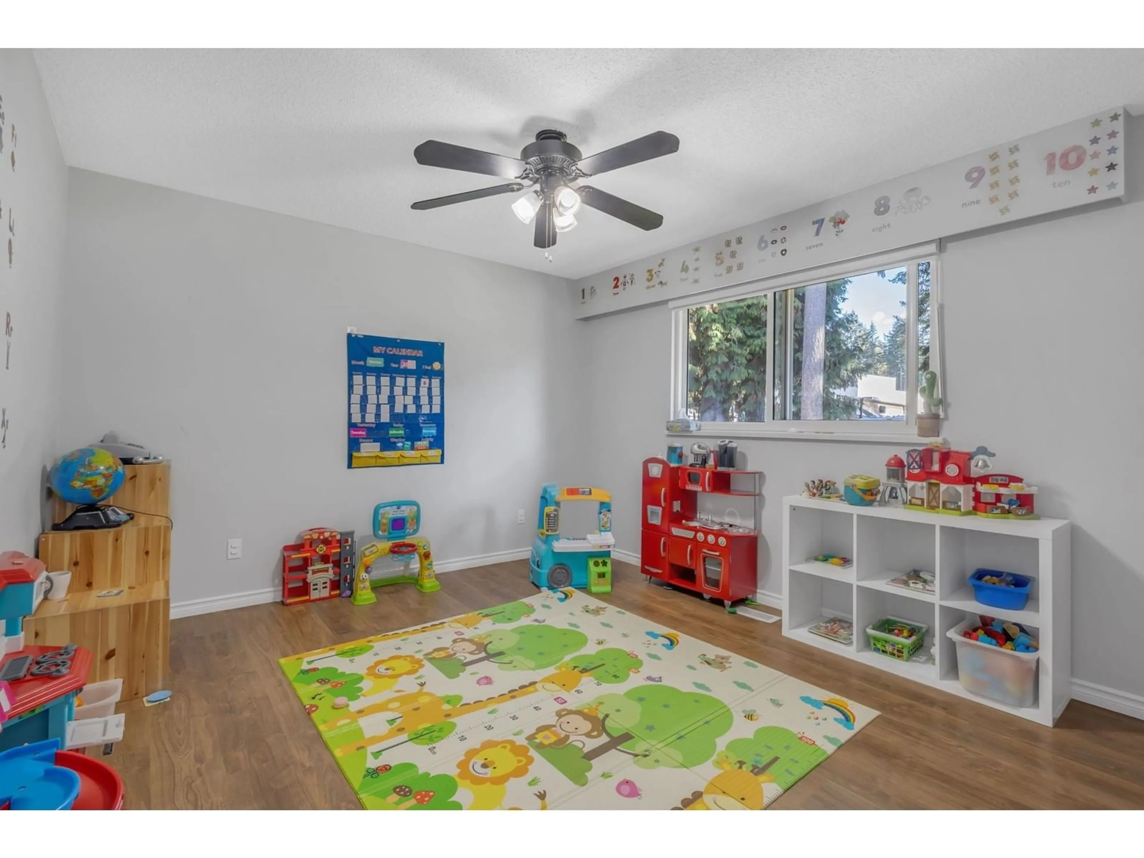 A pic of a room, wood floors for 4084 207A STREET, Langley British Columbia V3A2G6