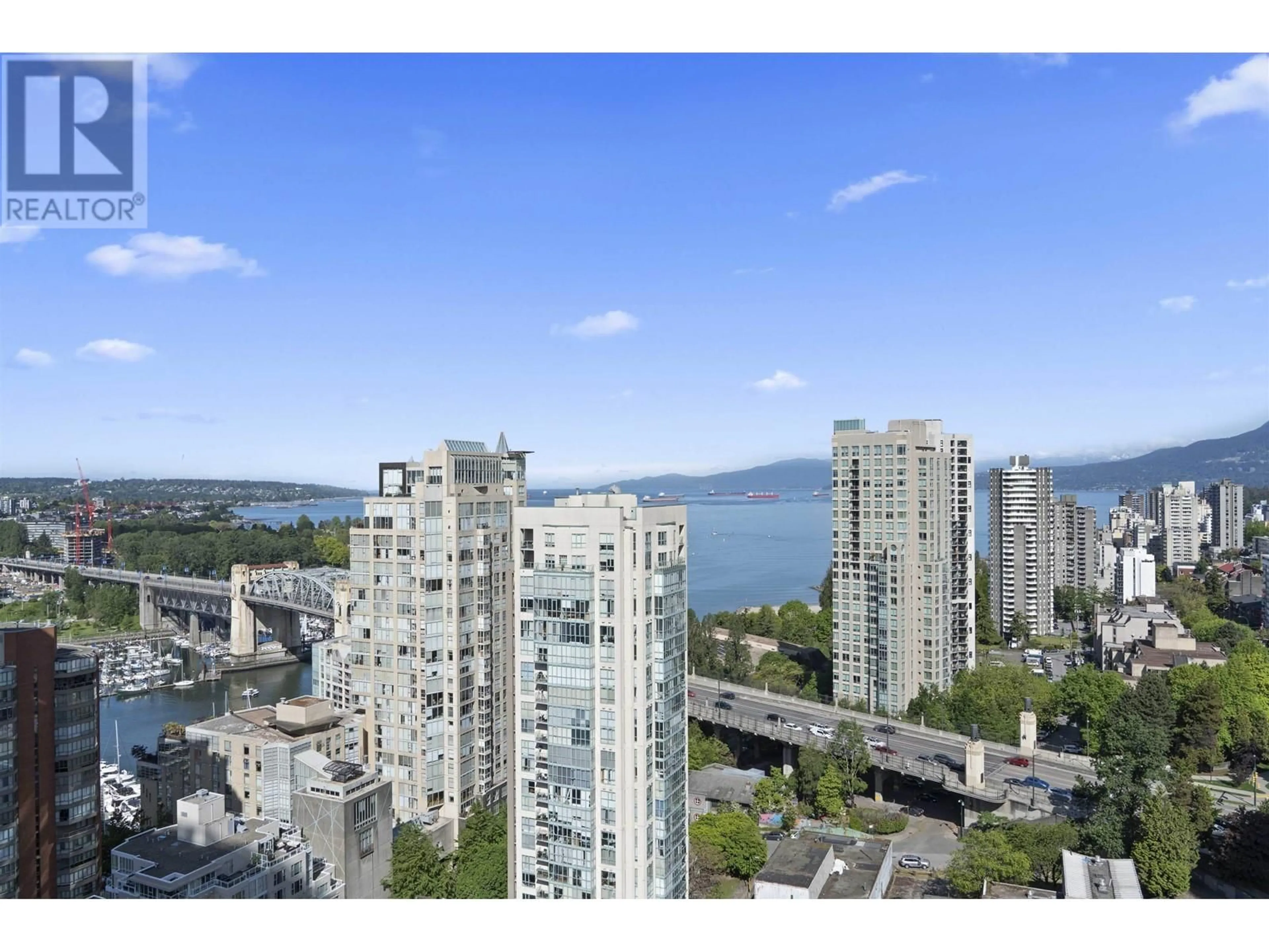 A pic from exterior of the house or condo, the view of city buildings for 2301 1455 HOWE STREET, Vancouver British Columbia V6Z1C2