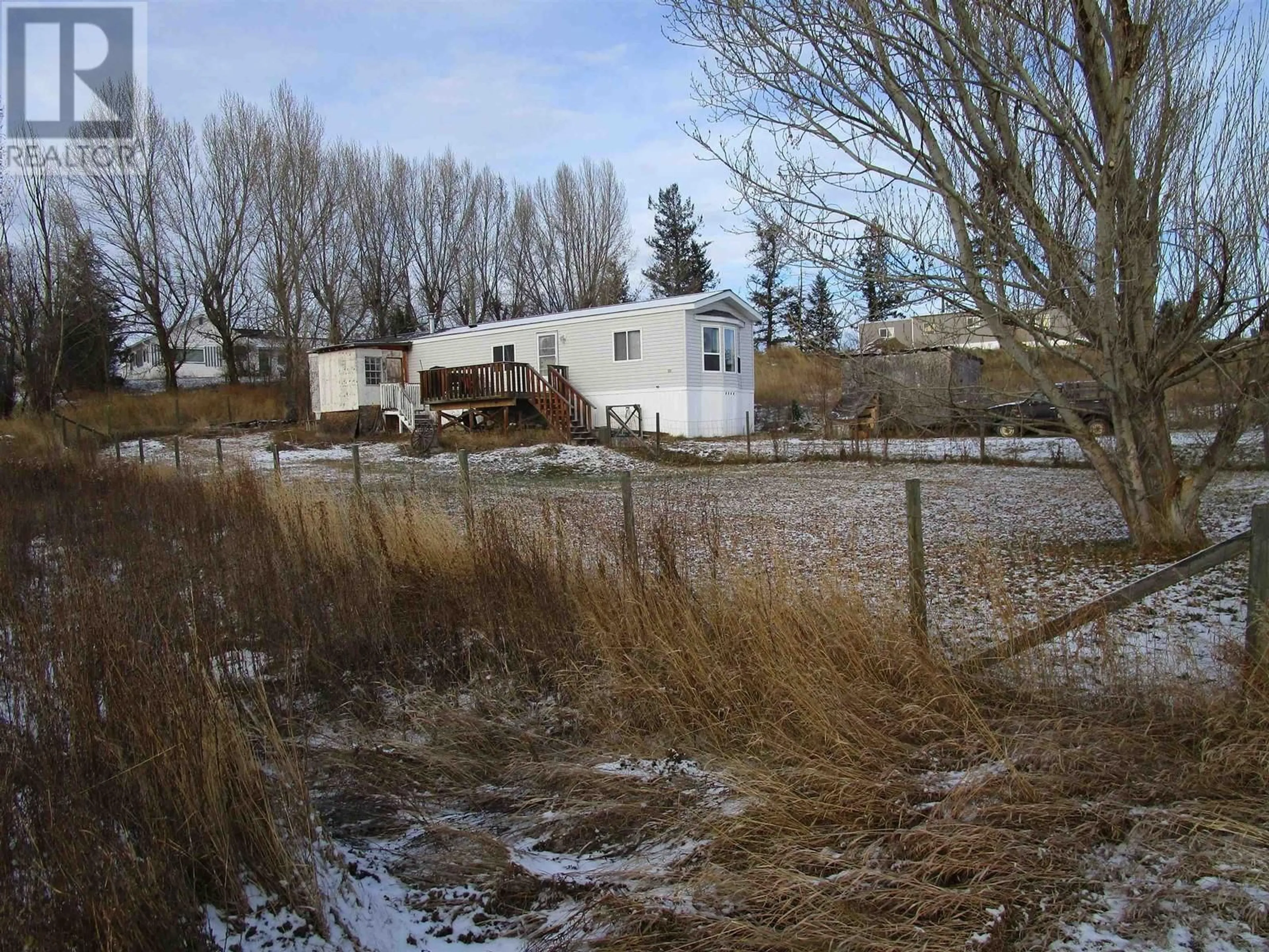 Frontside or backside of a home, cottage for 5545 LAKESIDE COURT, 103 Mile House British Columbia V0K2E1