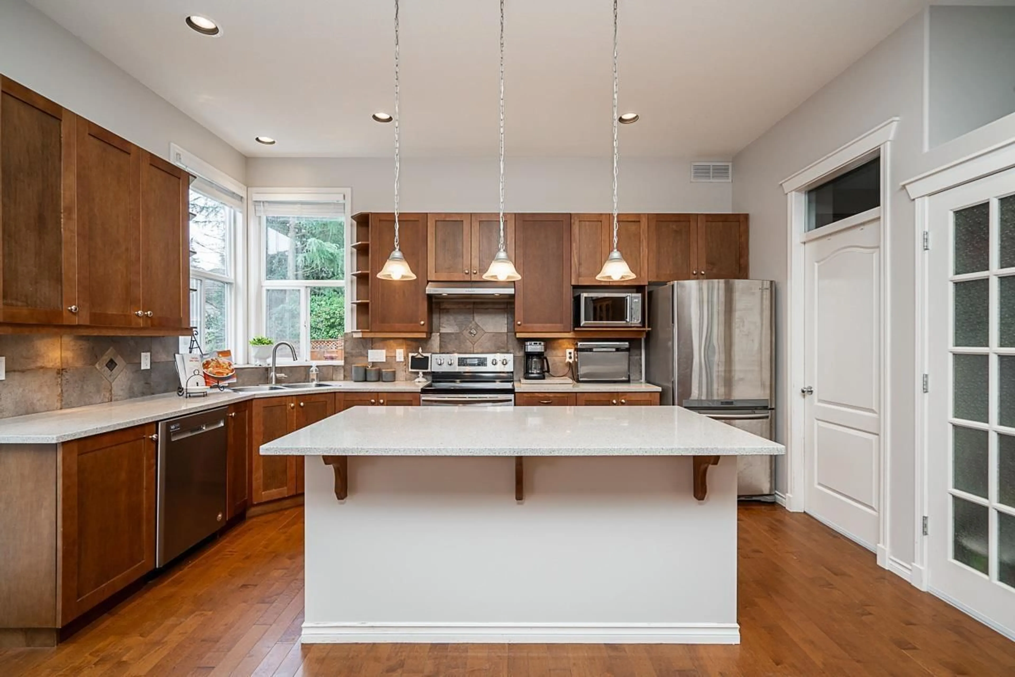 Open concept kitchen for 3488 150 STREET, Surrey British Columbia V3Z0T5