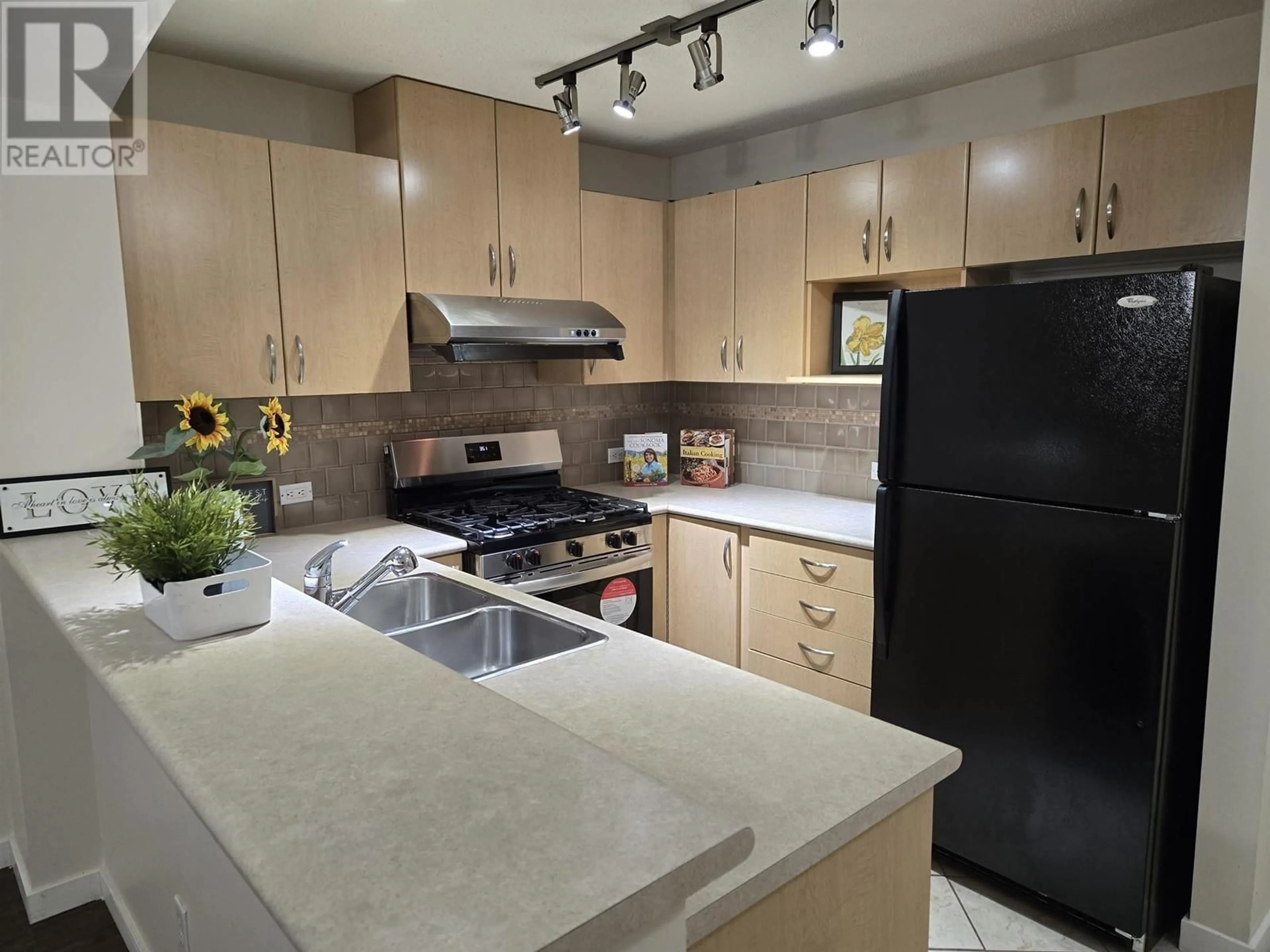 Standard kitchen, cement floor for 206 2988 SILVER SPRINGS BOULEVARD, Coquitlam British Columbia V3E3R6