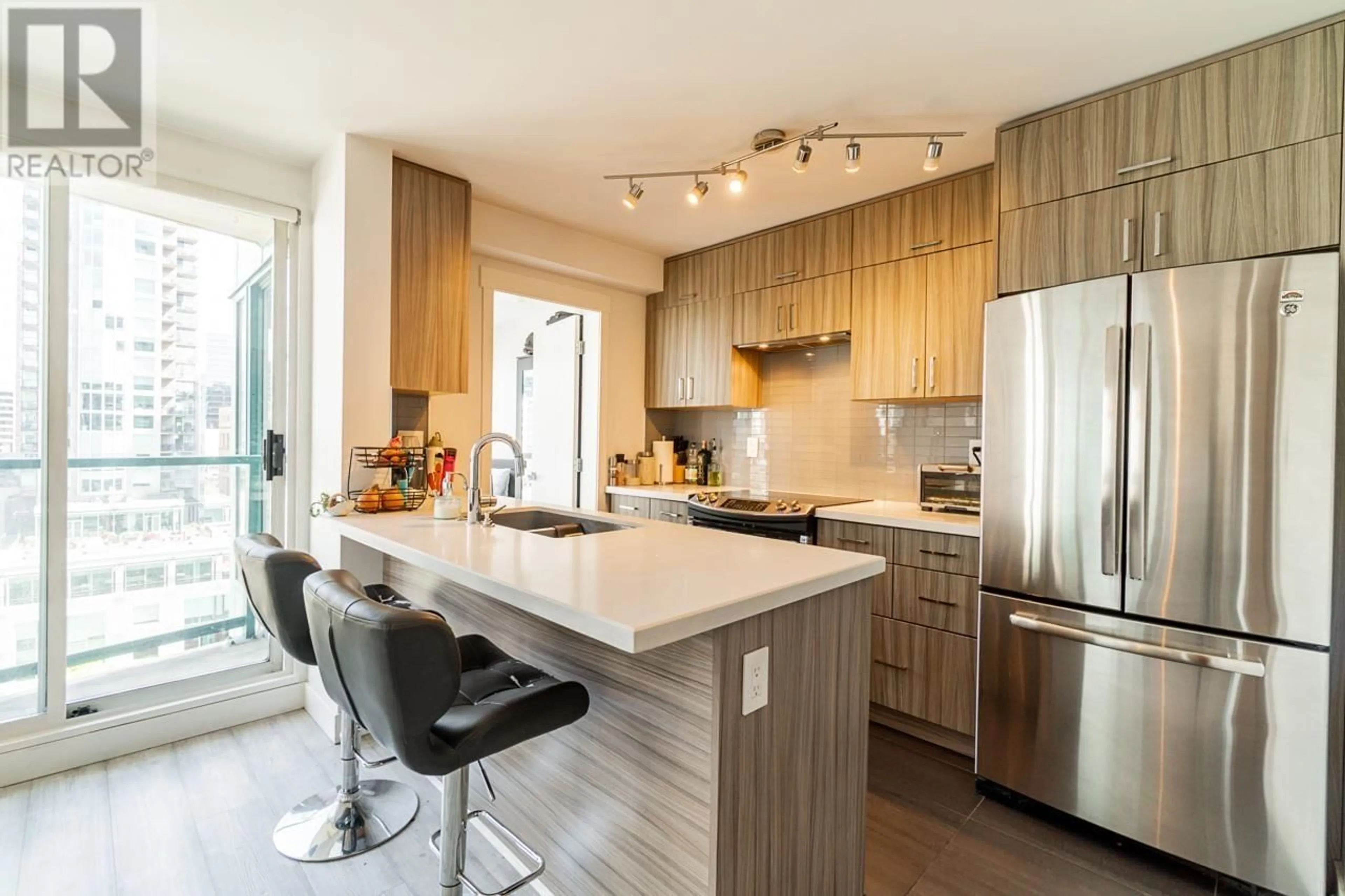 Contemporary kitchen, wood floors, mountain for 1702 939 HOMER STREET, Vancouver British Columbia V6B2W6