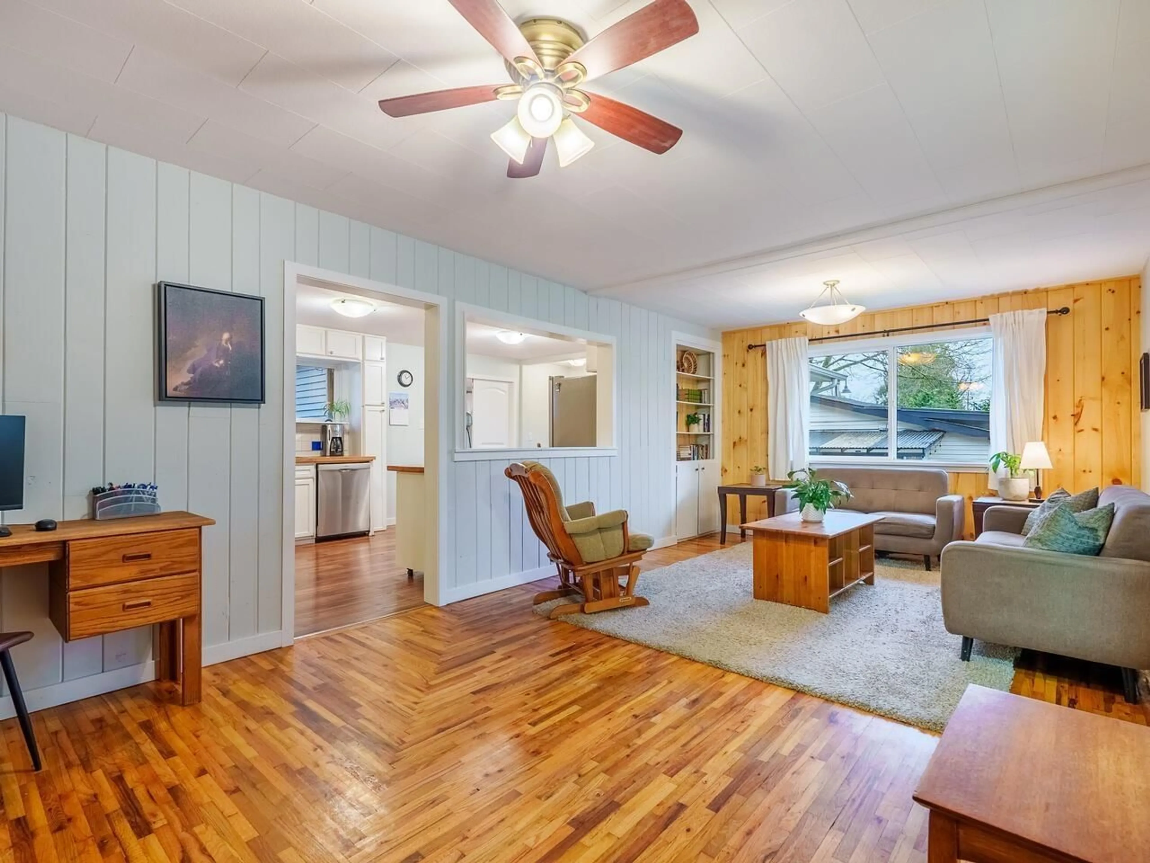 Living room with furniture, wood/laminate floor for 9097 GLOVER ROAD, Langley British Columbia V1M2S3