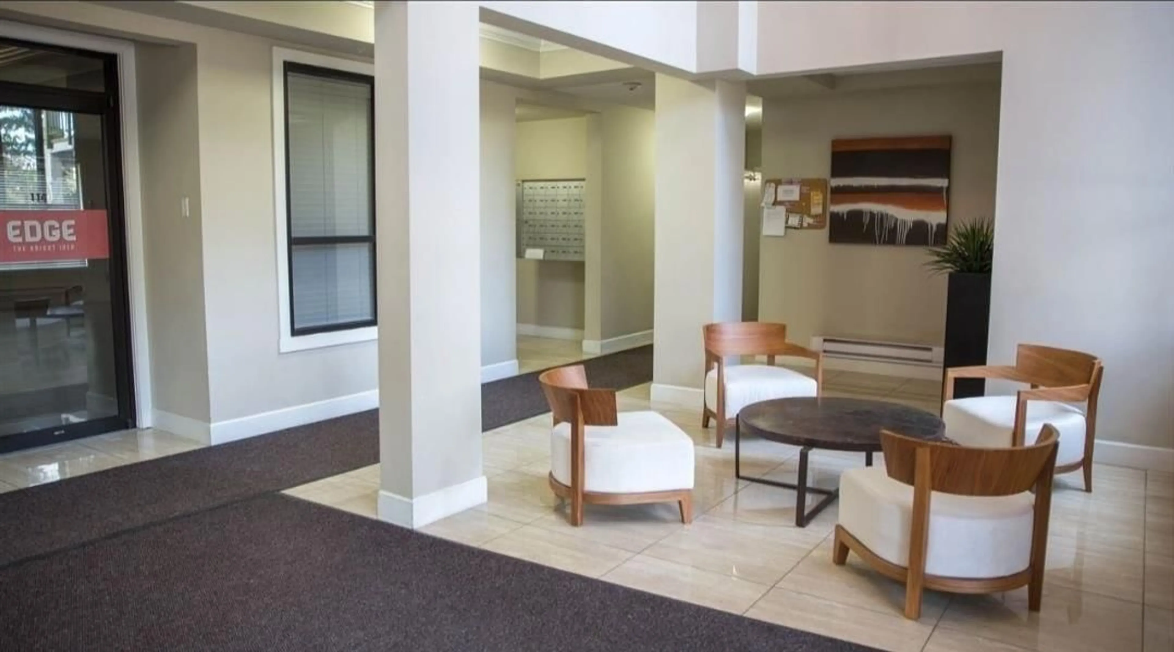 Indoor lobby, carpet floors for 415 13897 FRASER HIGHWAY, Surrey British Columbia V3T0G8