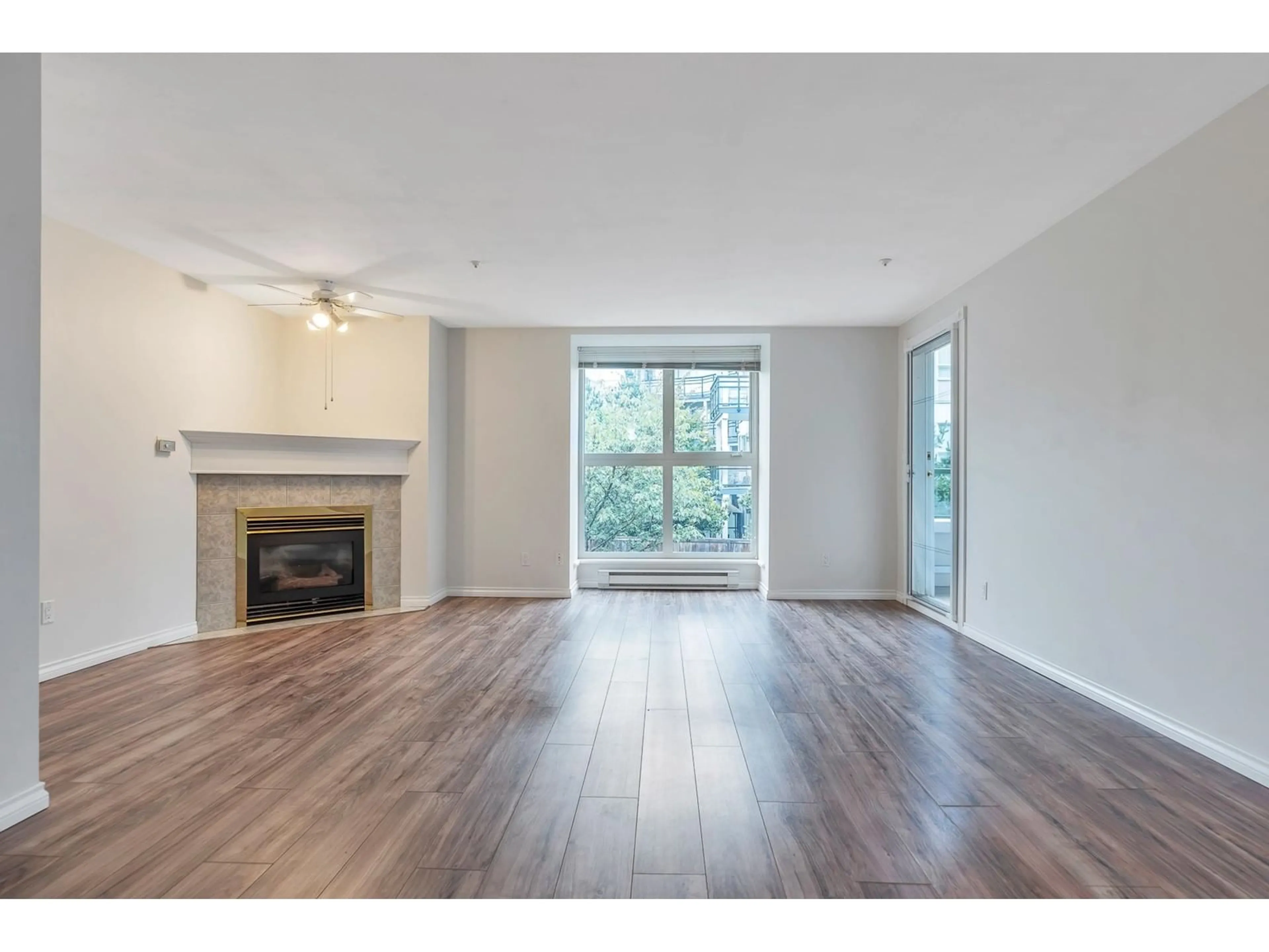 A pic of a room, wood floors for 209 10128 132 STREET, Surrey British Columbia V3T3T5