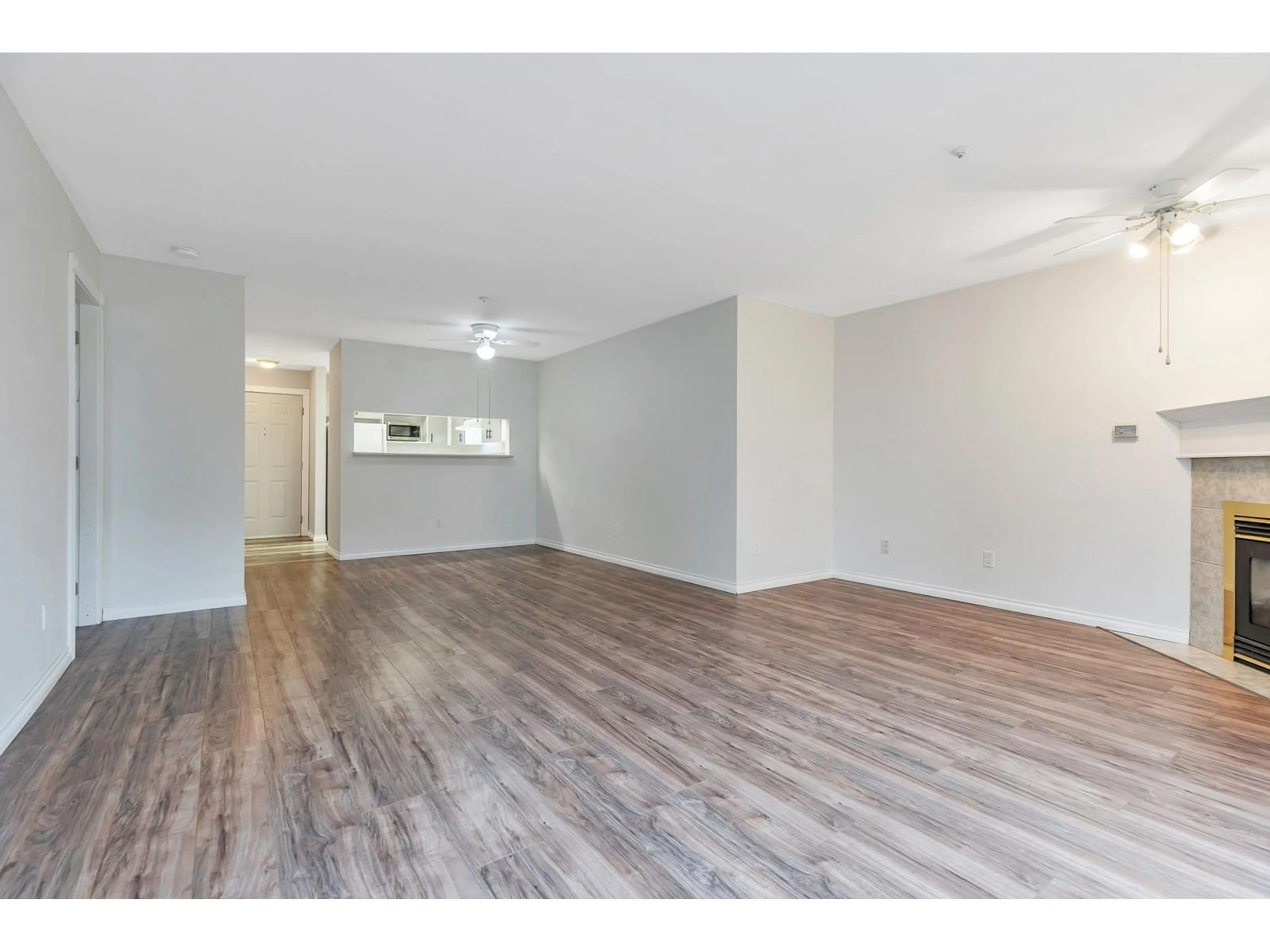 A pic of a room, wood floors for 209 10128 132 STREET, Surrey British Columbia V3T3T5