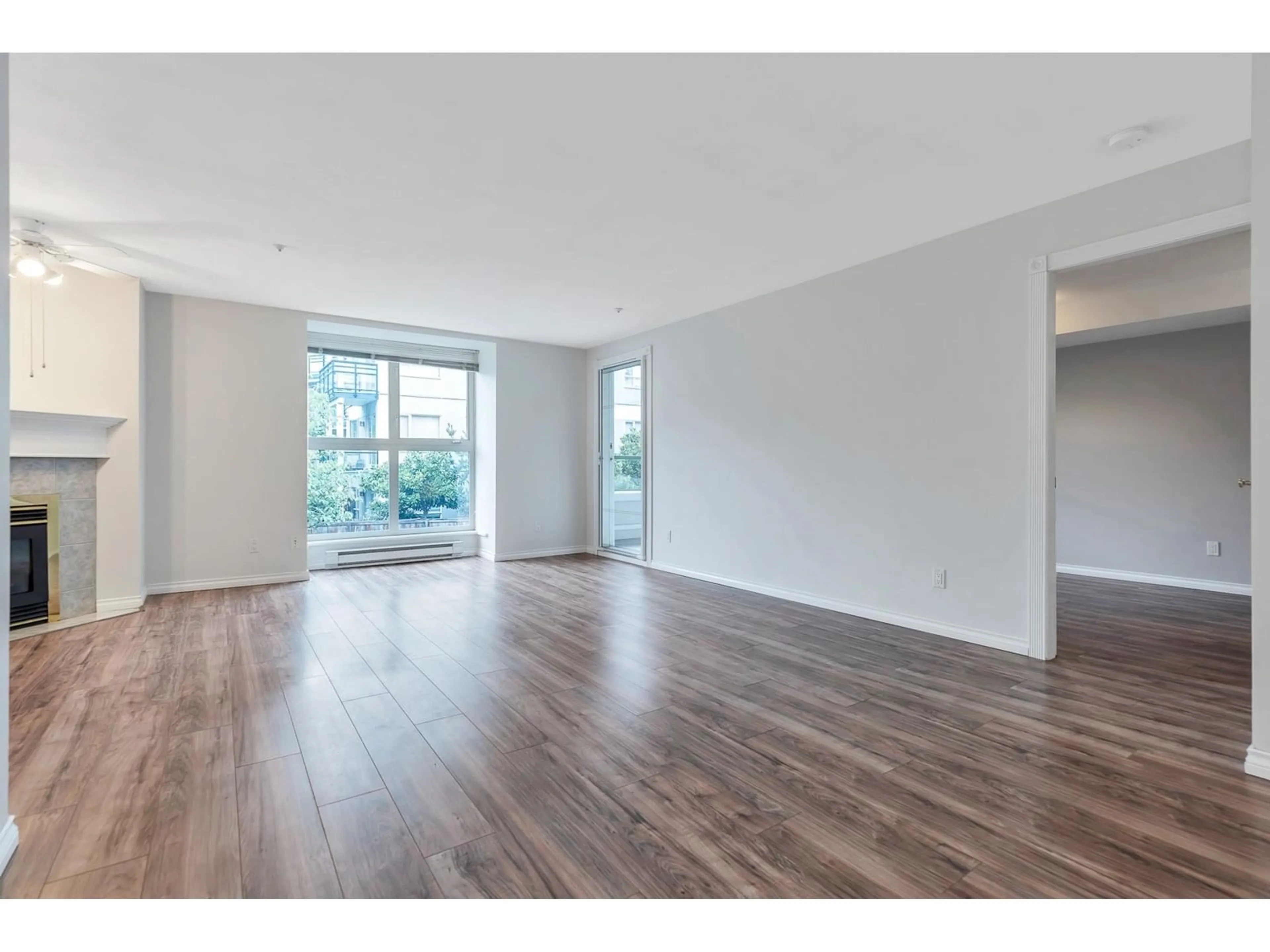 A pic of a room, wood floors for 209 10128 132 STREET, Surrey British Columbia V3T3T5