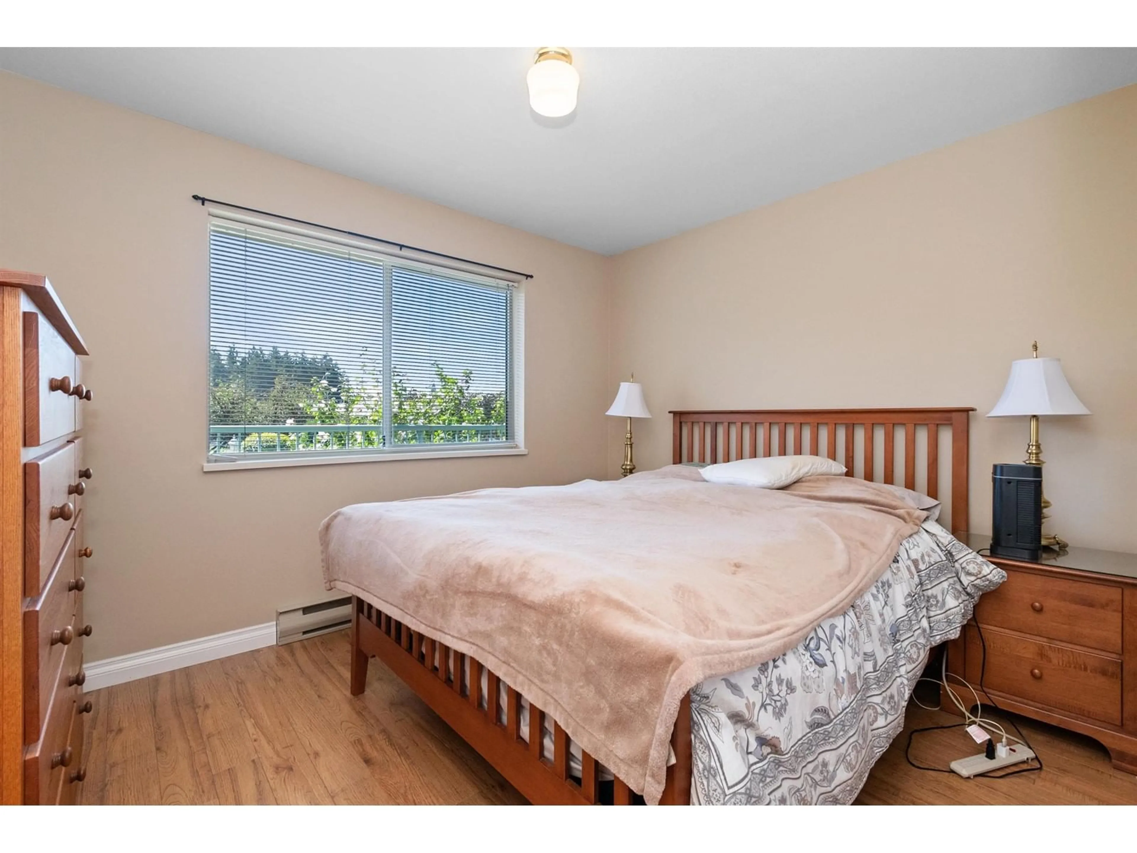 A pic of a room, wood floors for 123 2451 GLADWIN ROAD, Abbotsford British Columbia V2T3N8