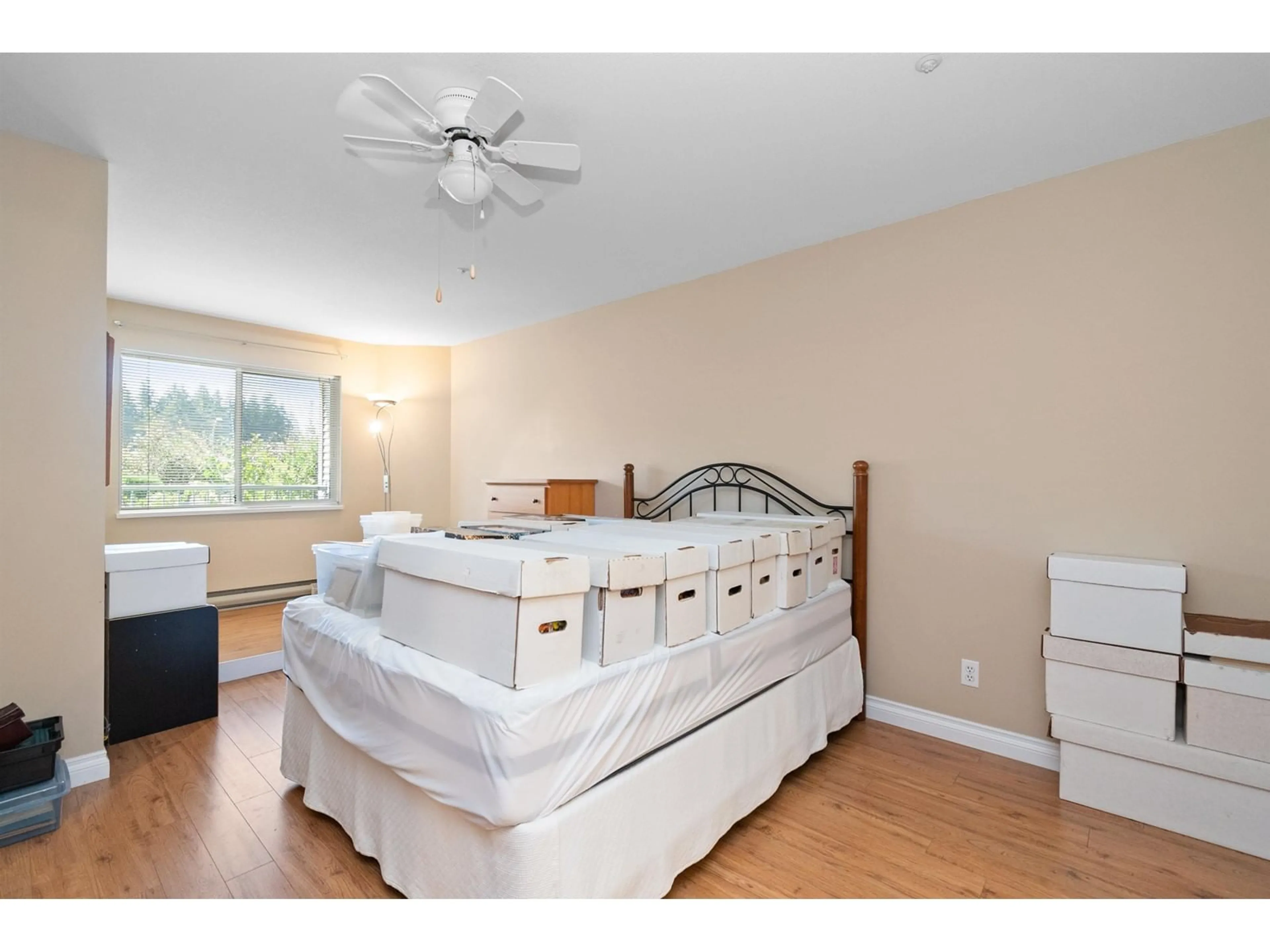 A pic of a room, wood floors for 123 2451 GLADWIN ROAD, Abbotsford British Columbia V2T3N8