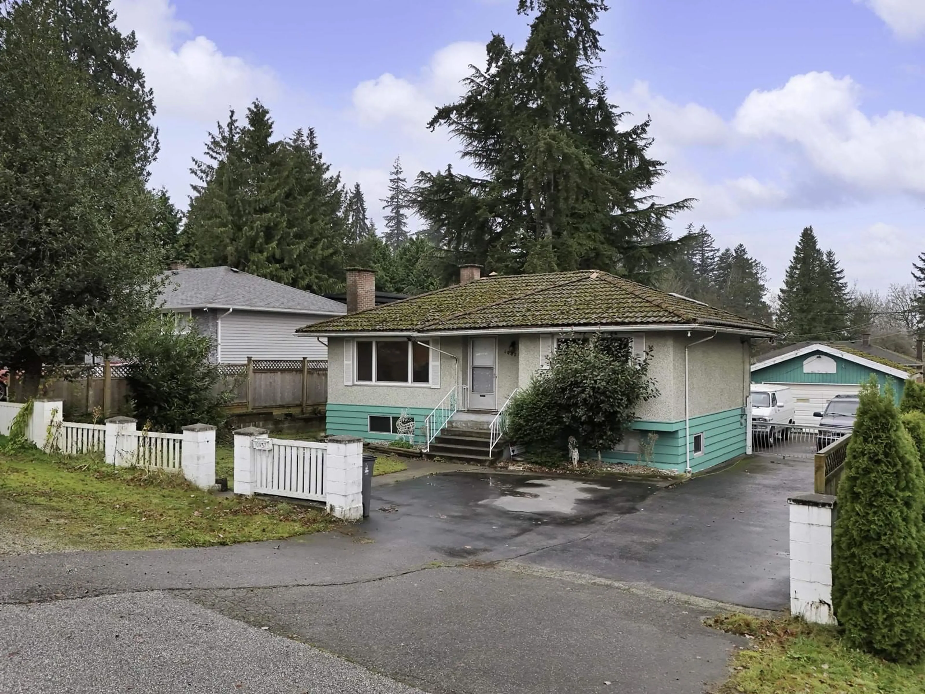 Frontside or backside of a home, the street view for 10837 128A AVENUE, Surrey British Columbia V3T3E9